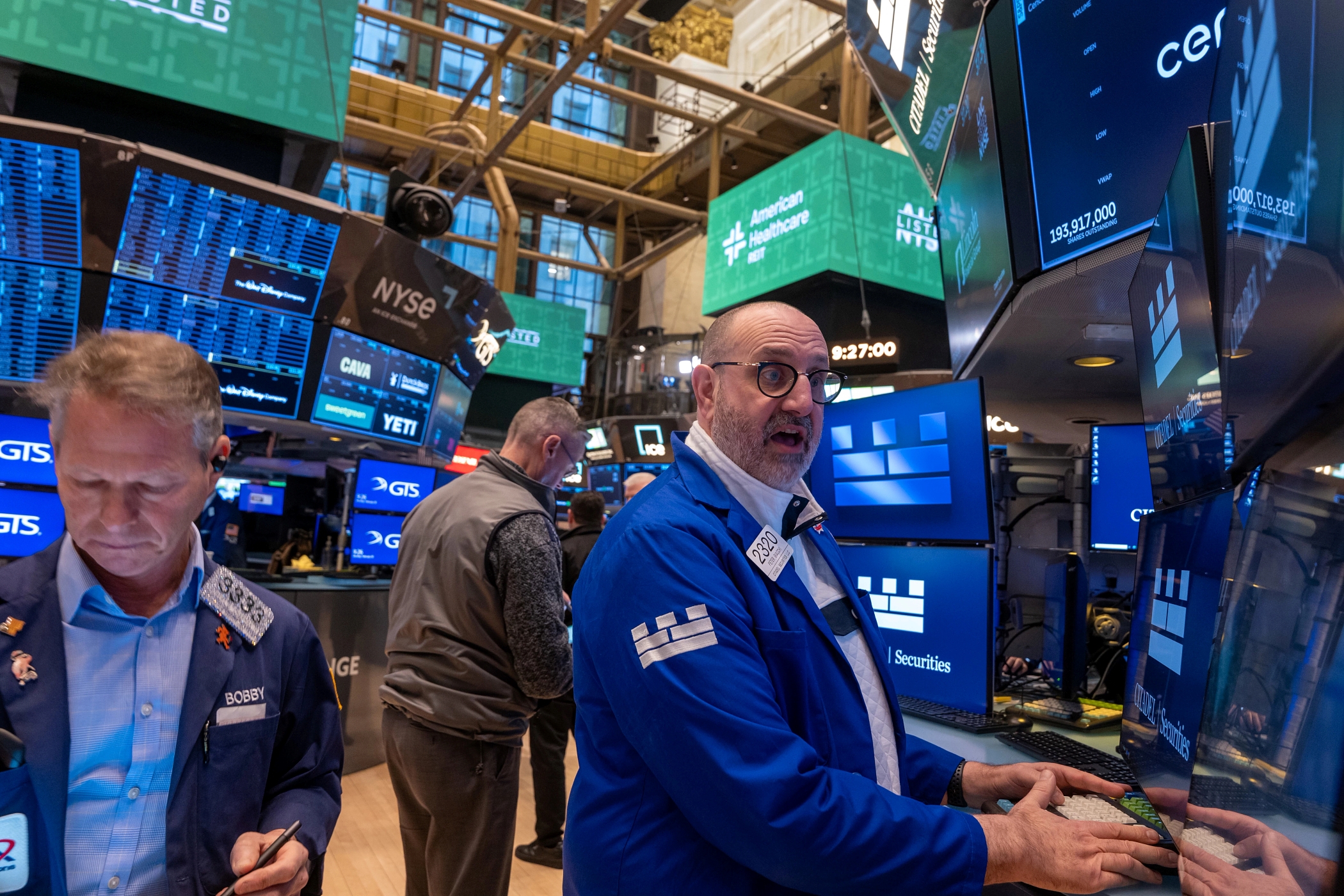 U.S. stock markets posted losses and retailers warned of coming price increases as new trade tariffs took effect Tuesday. (Getty Images)