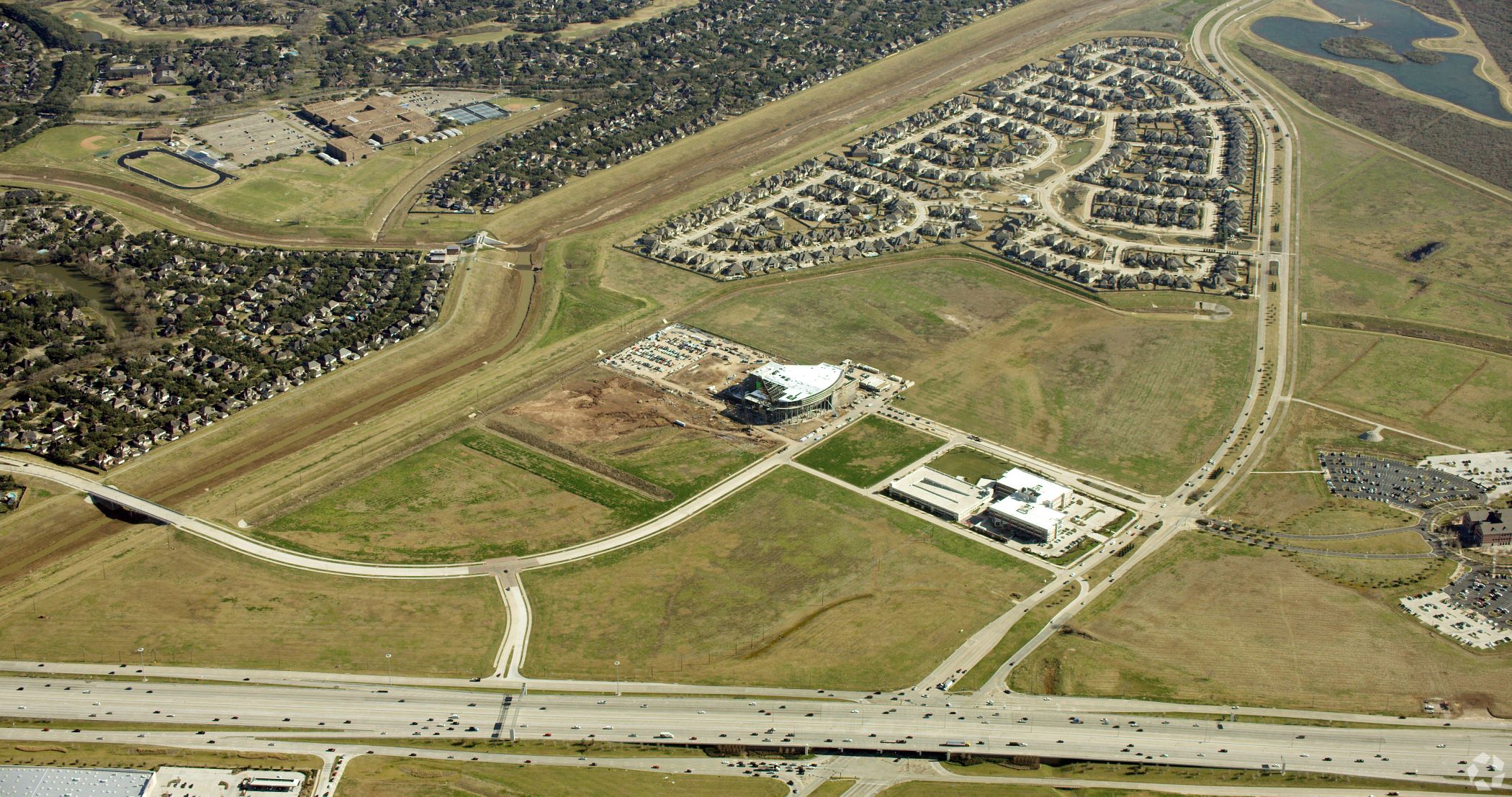 A 50-acre plot adjacent to Smart Financial Centre in Sugar Land, Texas, has been bought by Dhanani Private Equity Group. (CoStar)