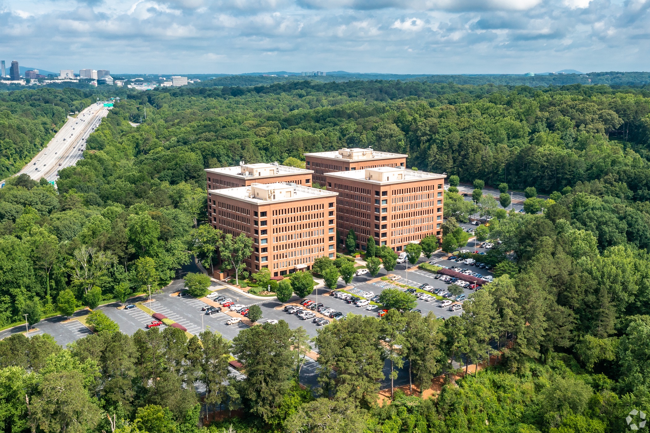 Landmark Properties acquired the Northcreek office park in Atlanta and plans to assign some back-office workers to the complex. (CoStar)