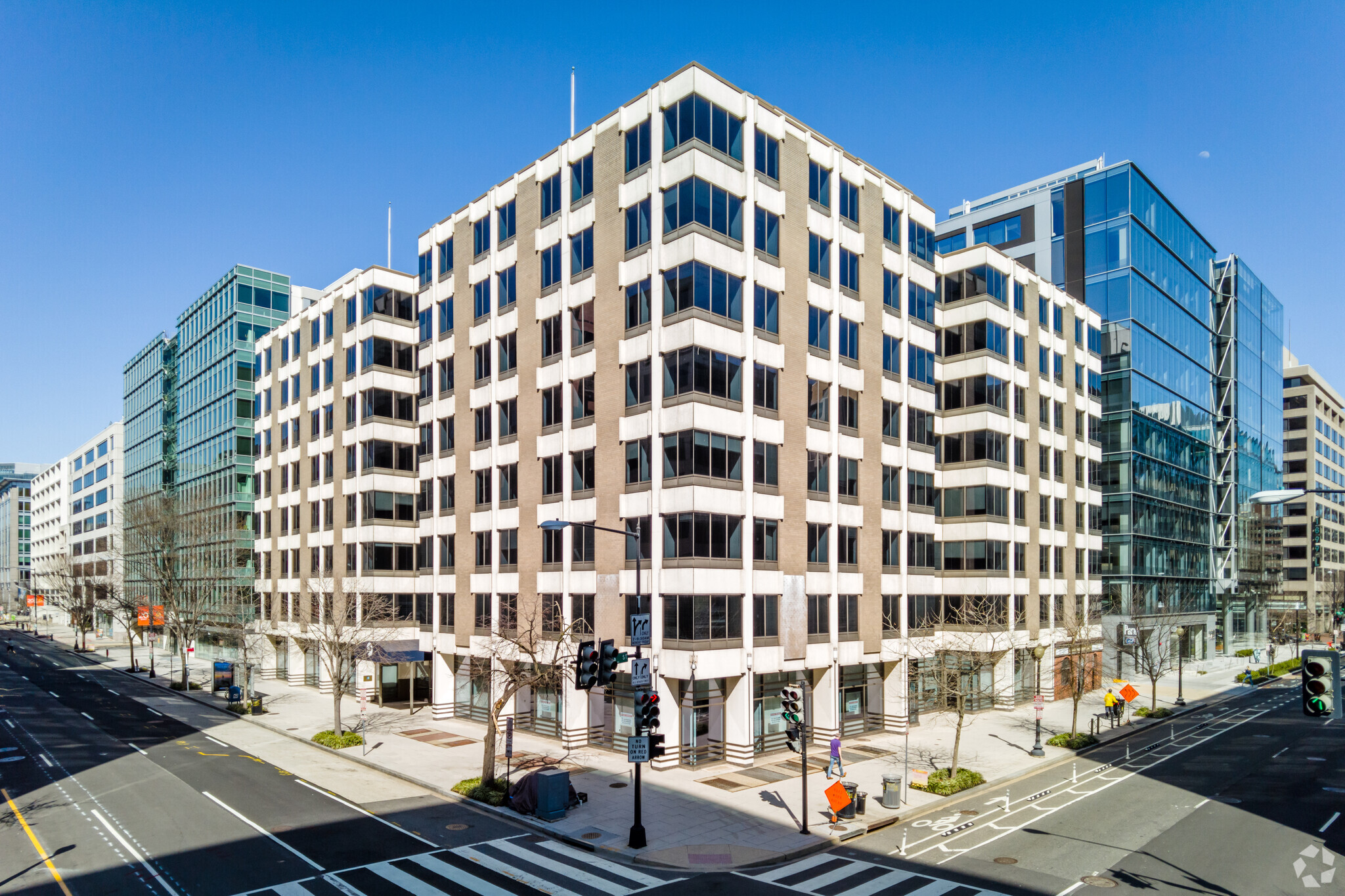 The eight-story office building at 1111 20th St. NW in Washington, D.C., is getting redeveloped into 163 apartments. (CoStar)