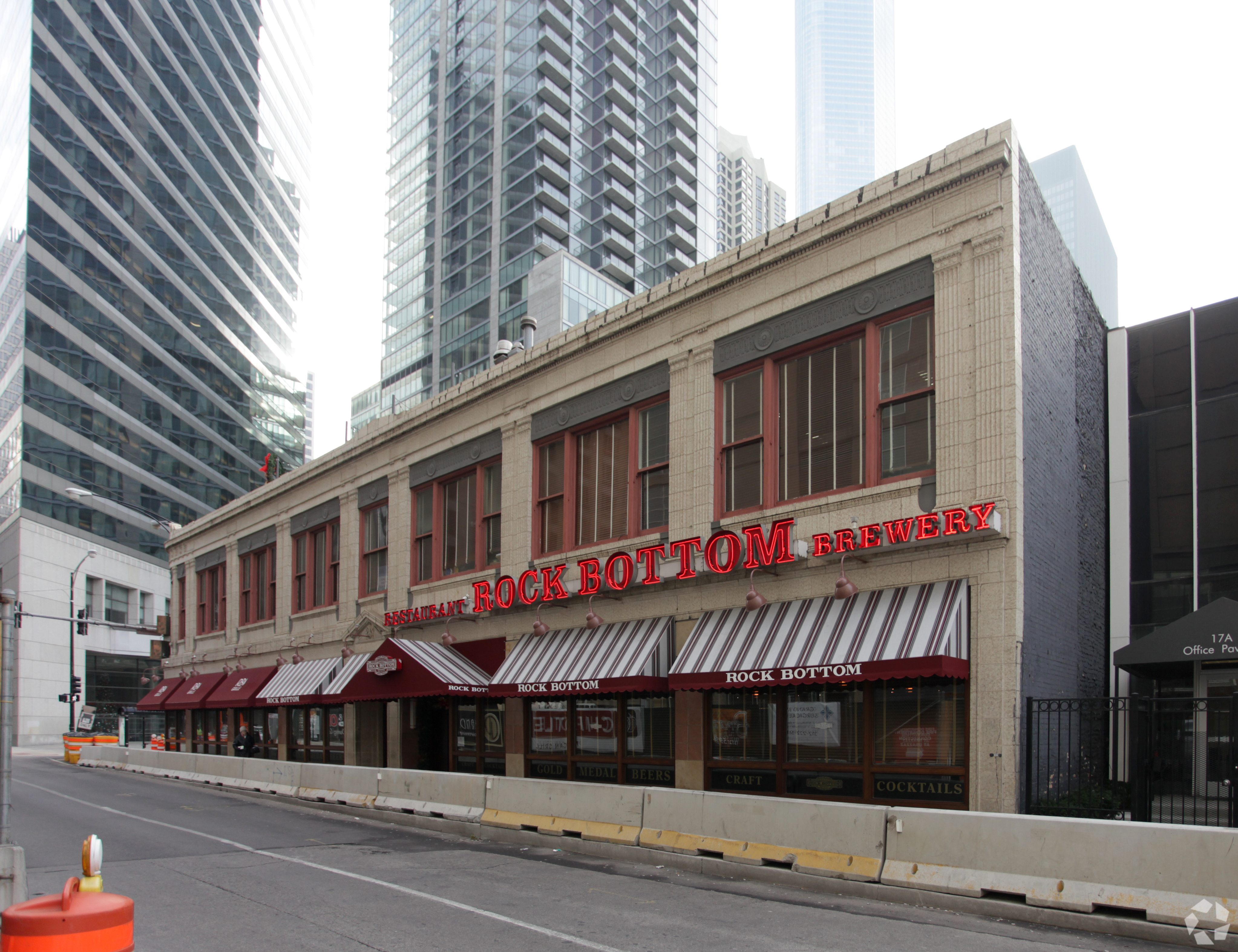 The two-story building at 512-522 N. State St. in Chicago is for sale after the recent closure of longtime tenant Rock Bottom Brewery. (CoStar)