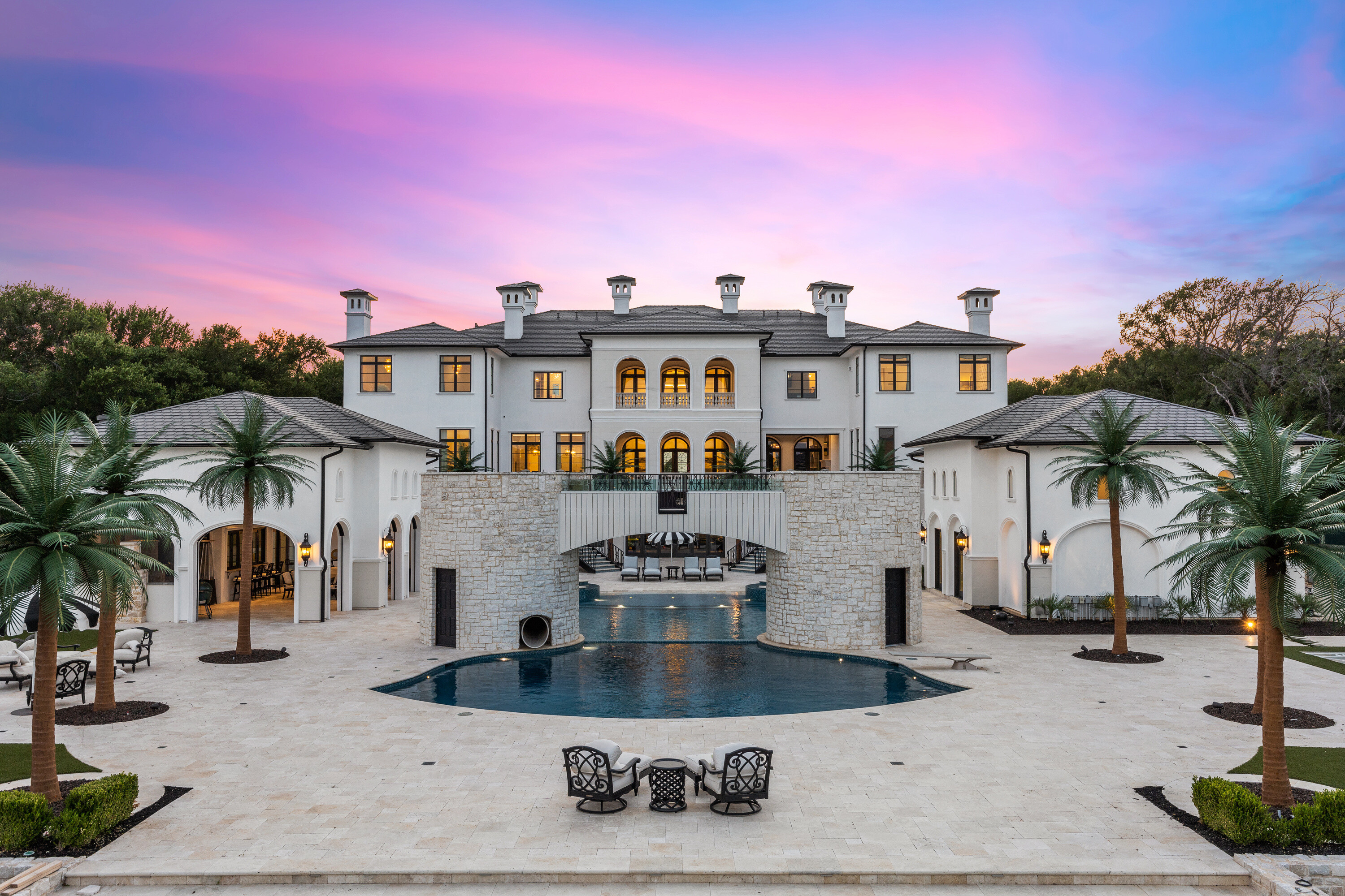 A view of the waterslide and pool at the rear of the house at 1469 Sunshine Lane in Southlake, Texas. (Full Package Media)