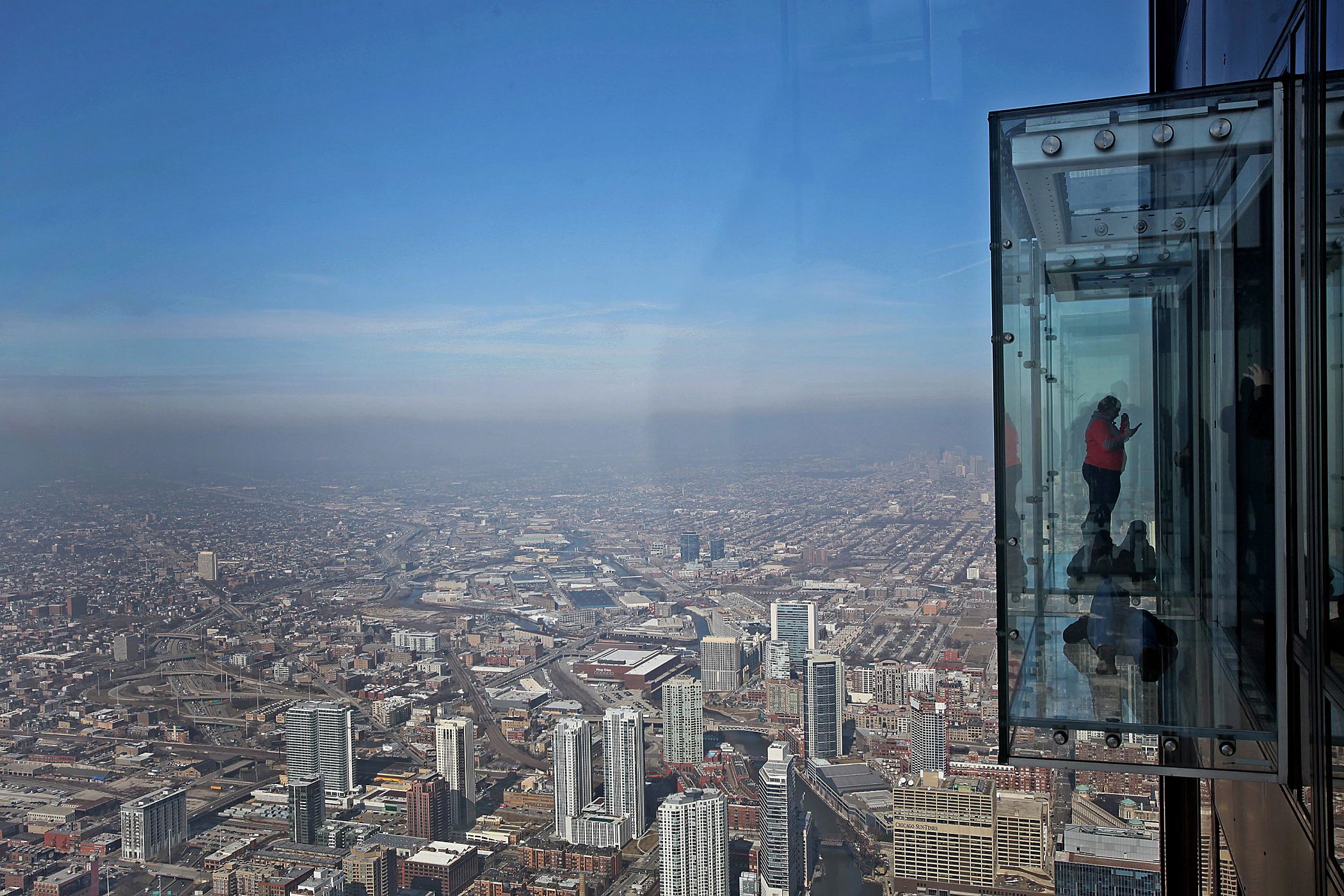 The Ledge attraction on the 103rd floor of Willis Tower includes five glass boxes that extend outside the Chicago skyscraper. (Getty Images)
