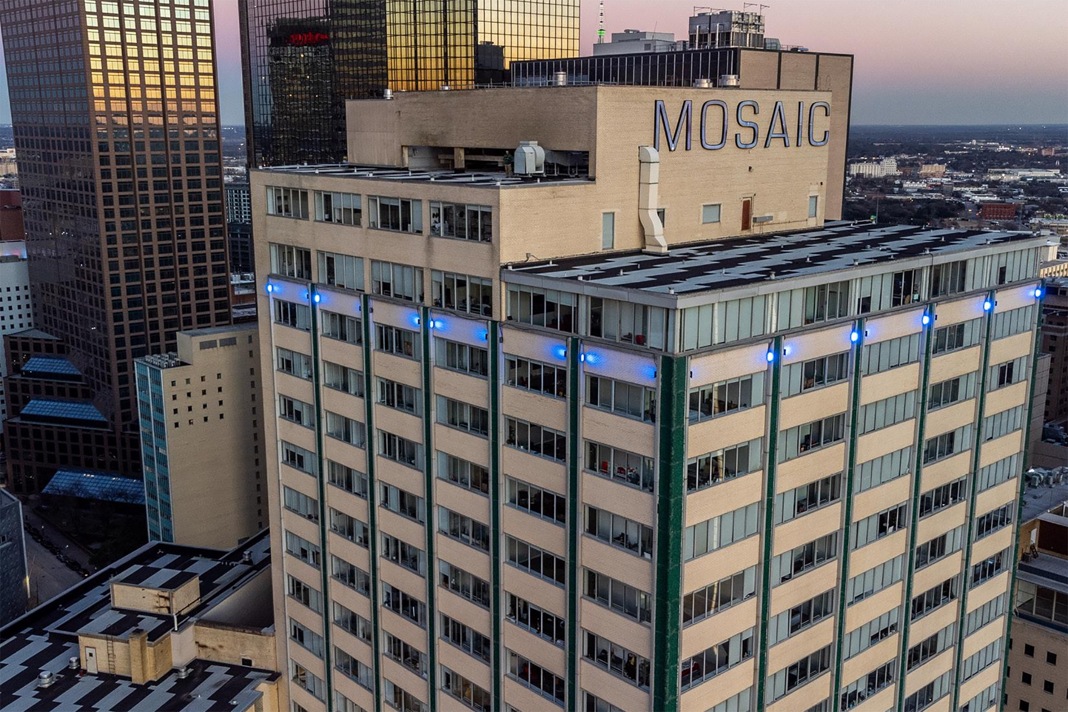 Mosaic Dallas, a two-tower apartment property with 440 units and 8,766 square feet of retail space, has sold to a new owner. (Marcus & Millichap's Institutional Property Advisors)
