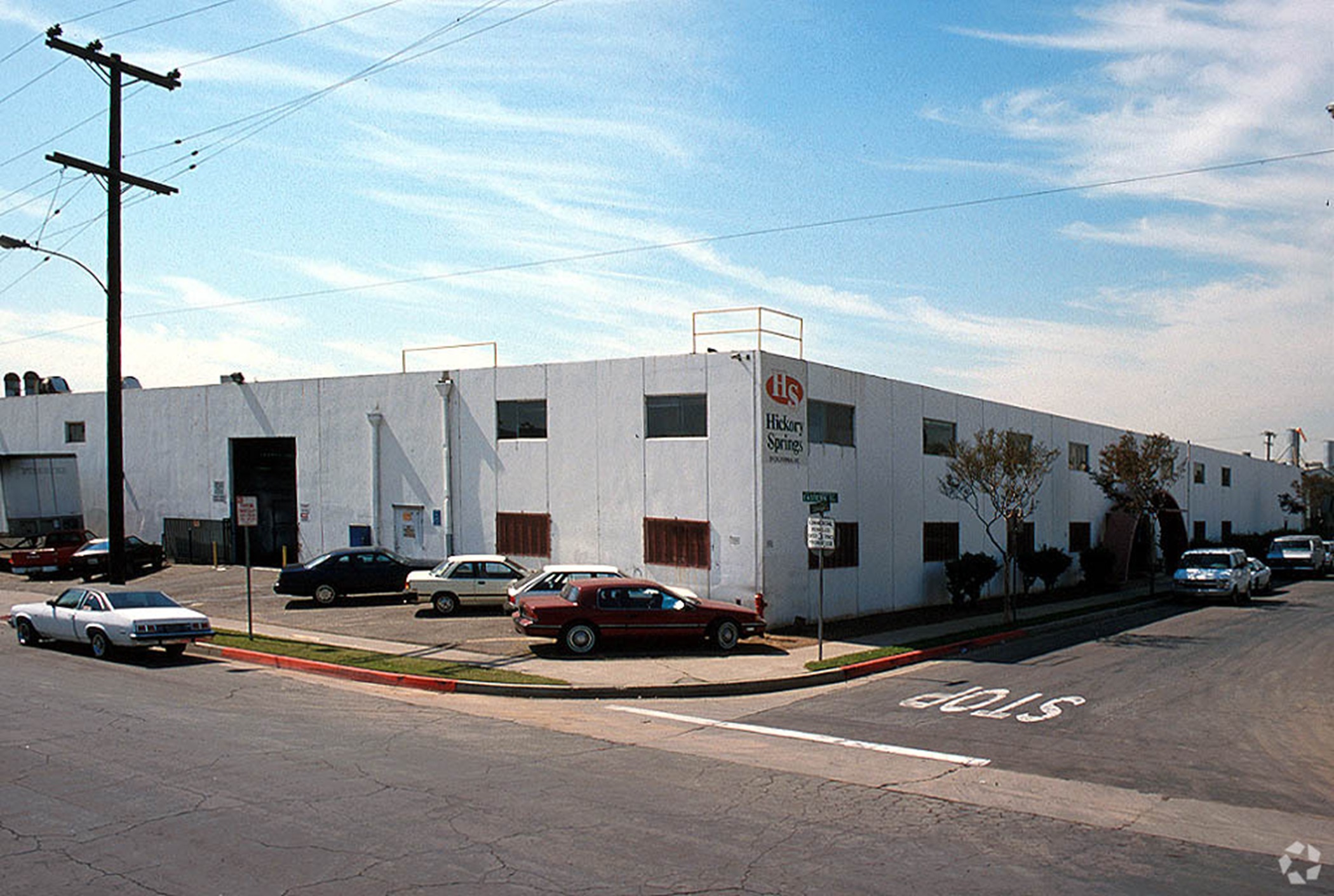 This 1965-era property rises two stories in Commerce, California. (CoStar)
