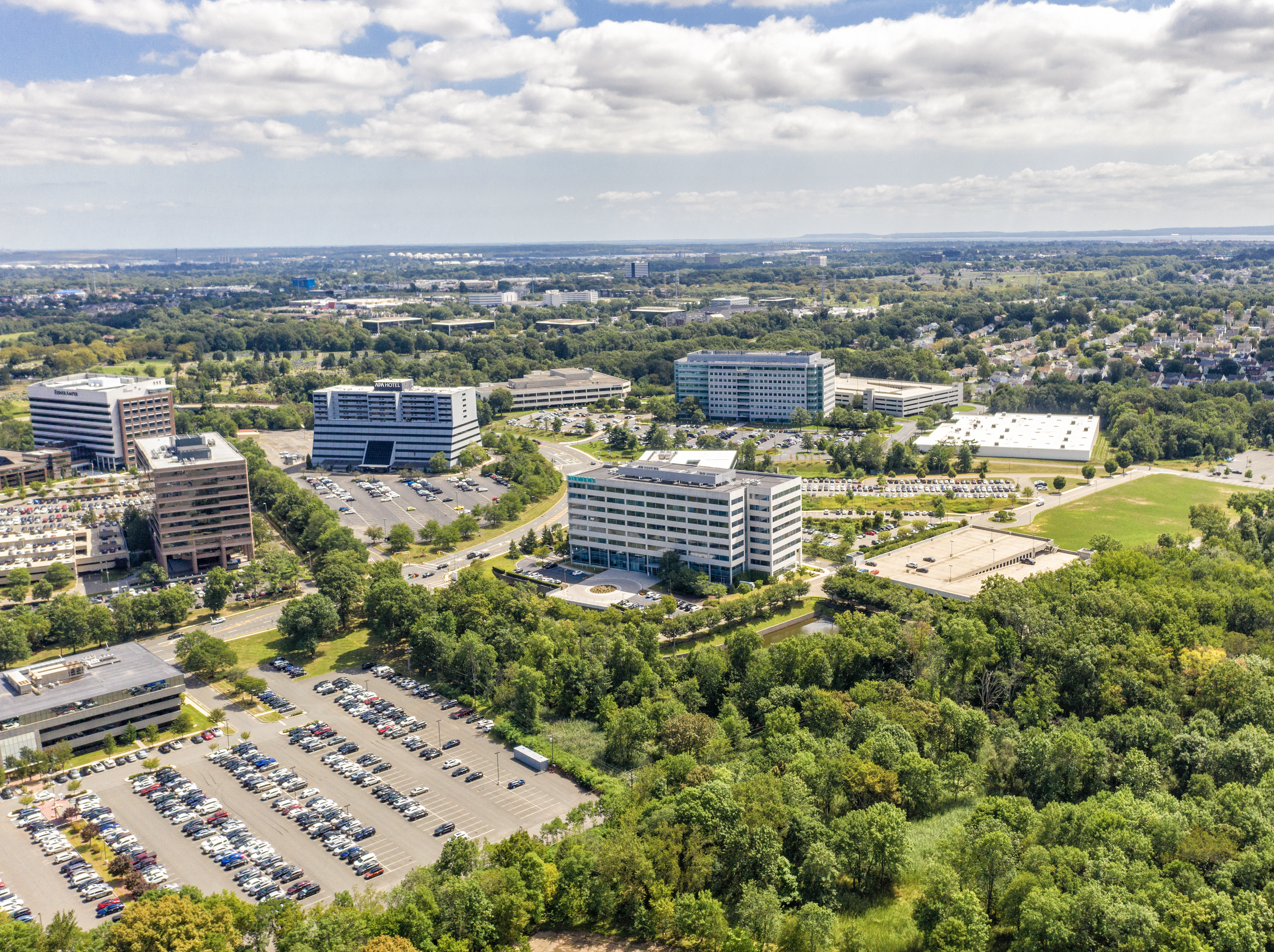 The office building that Argent Ventures purchased in Iselin, New Jersey, is part of Metropark, a roughly 19-acre site that once housed thousands of Siemens workers that has since been revitalized as a multitenant campus. The building became vacant after Siemens' leaseback-deal for the site expired. (JLL)