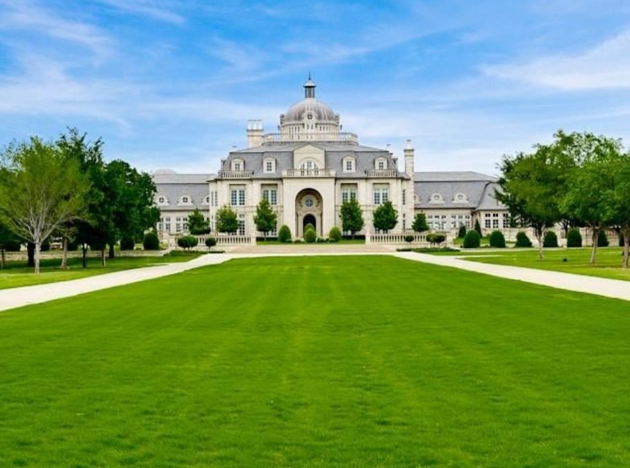 The 44,232-square-foot mansion at 1851 Turbeville Road was developed originally as a single-family home outside of Dallas. The mansion is modeled after an elaborate chateau in Paris. (Land.com)