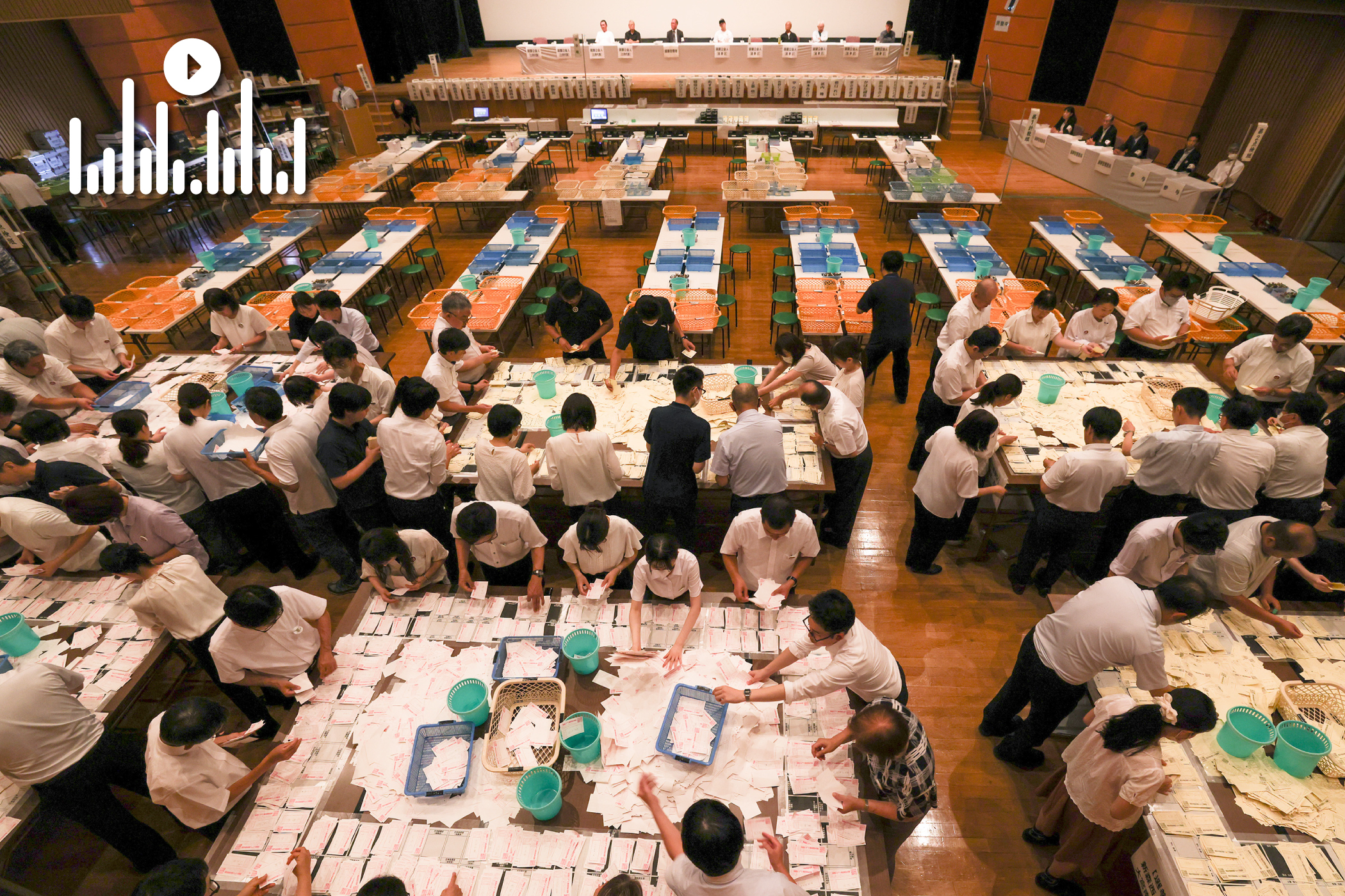 Election staff members count votes at a ballot counting center on July 20, 2025, in Osaka, Japan. (Getty Images)