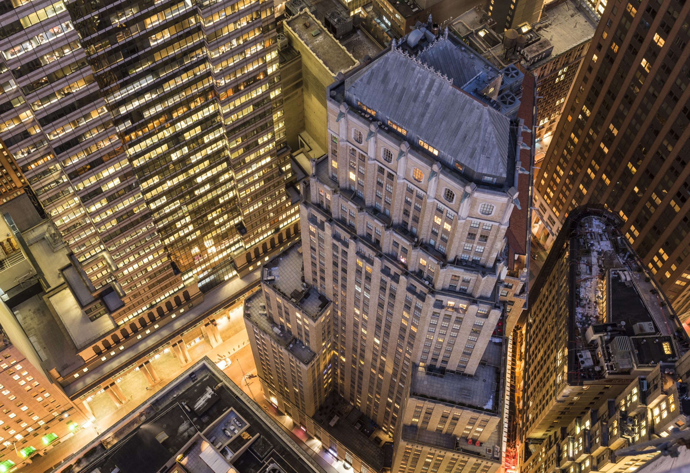 The two-tower complex at 63-67 Wall Street in Manhattan has landed a $275 million refinancing loan. (Rockpoint) 