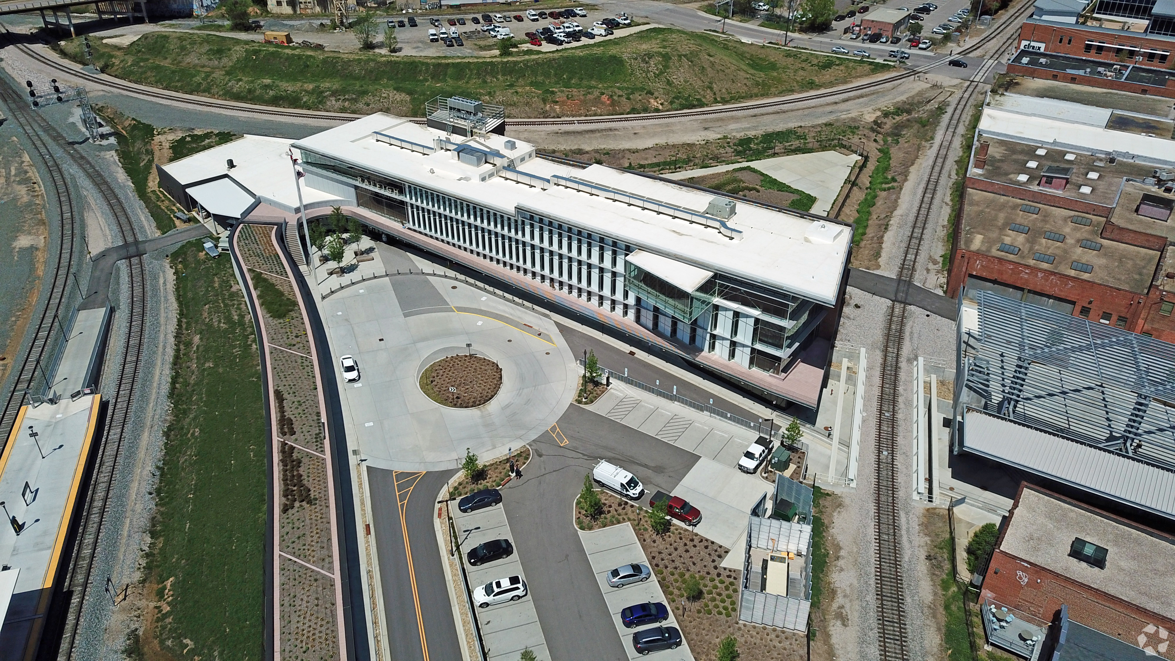 Architects designed the Amtrak station in Raleigh, North Carolina, to fit in a triangular-shaped lot surrounded by railroad tracks, surface streets and other buildings. (Lawrence Hiatt/CoStar)