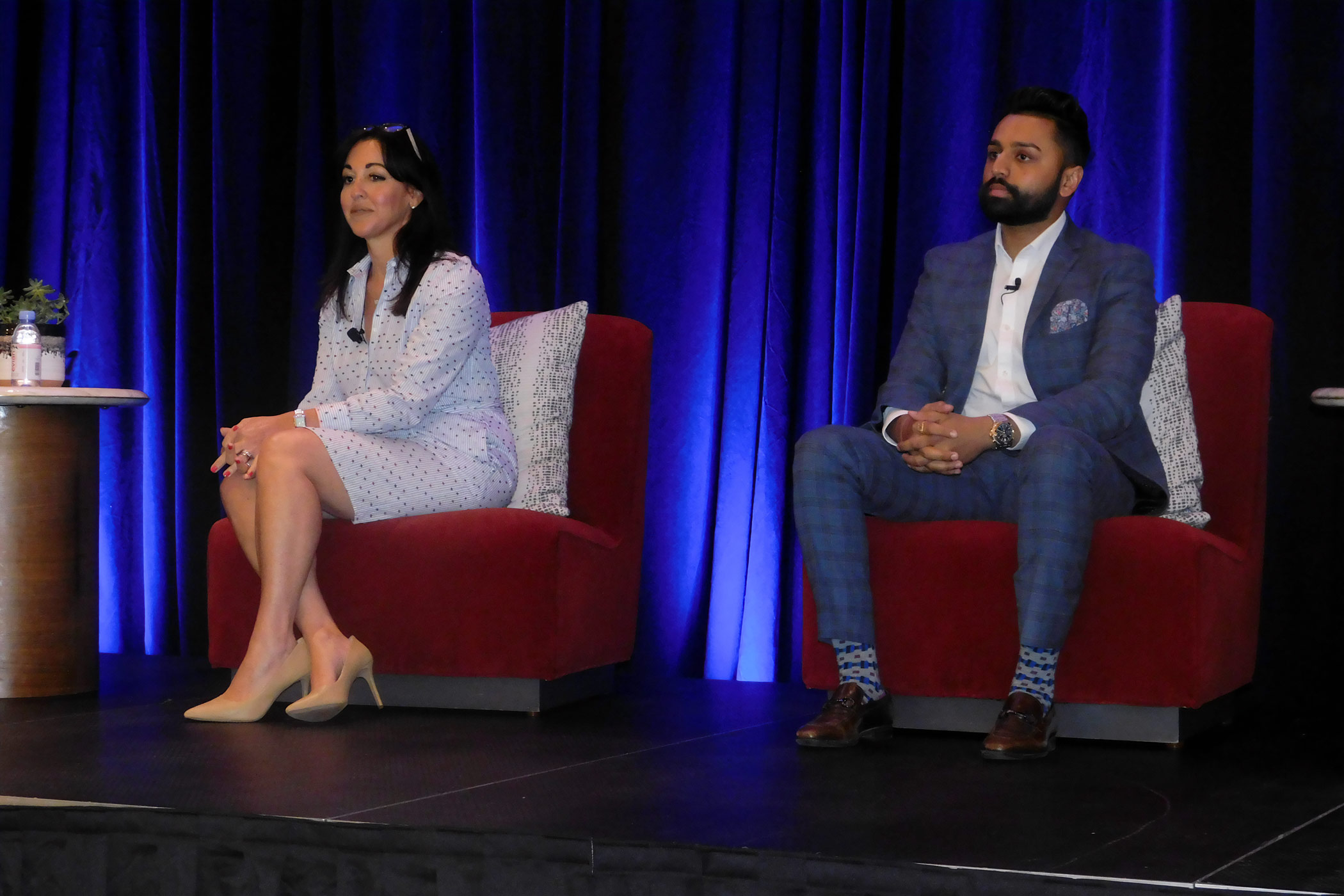 Kimpton Hotels & Resorts' Tiffany Cooper (left) and Wayside Investment Group's Miraj Patel speak at the 2022 ALIS Summer Update event in Dallas. (Sean McCracken)