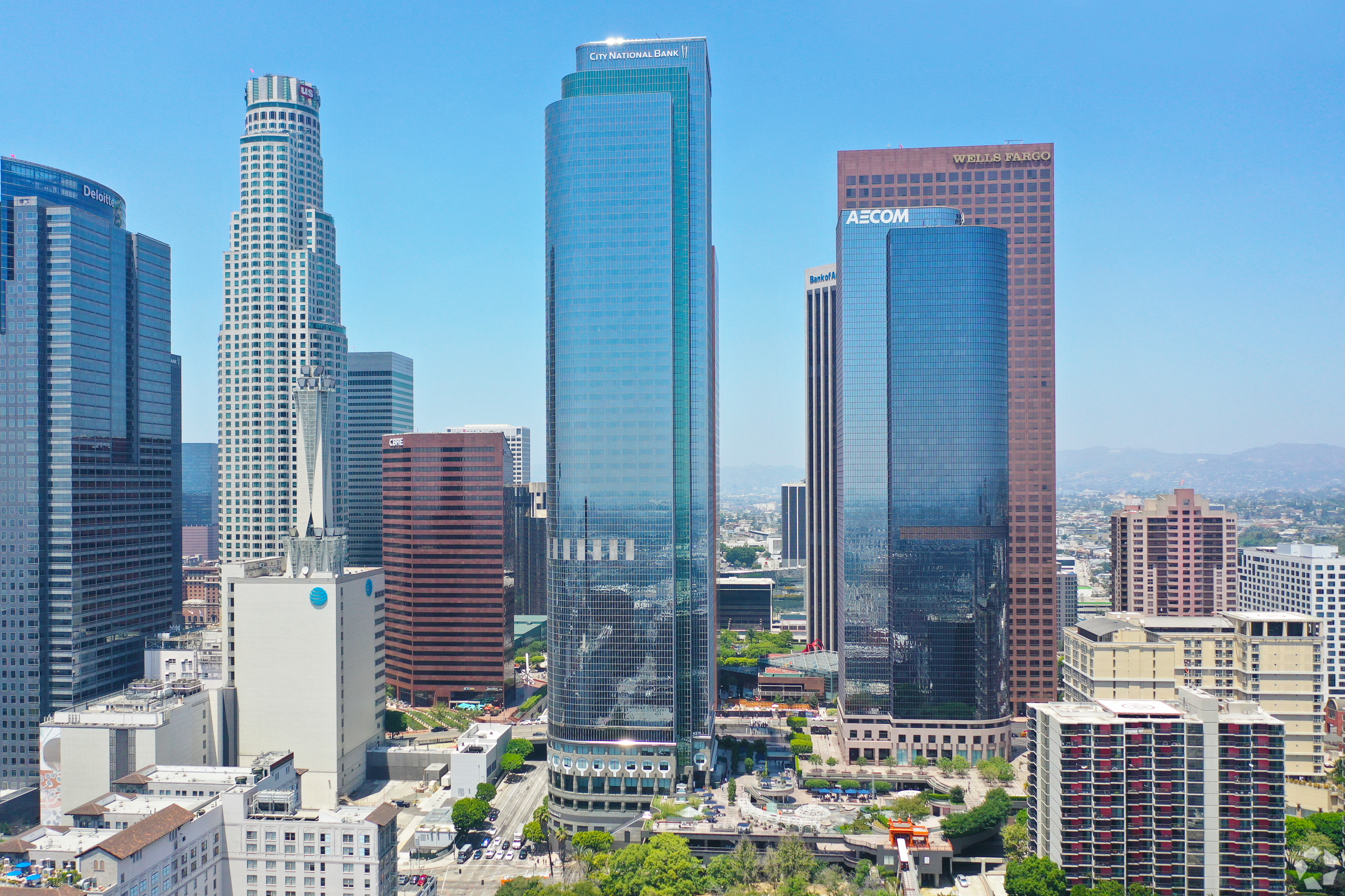 The 42-story One California Plaza's increased vacancy and reduced cash flow pushed assessors to slash its valuation, according to a Morningstar report.