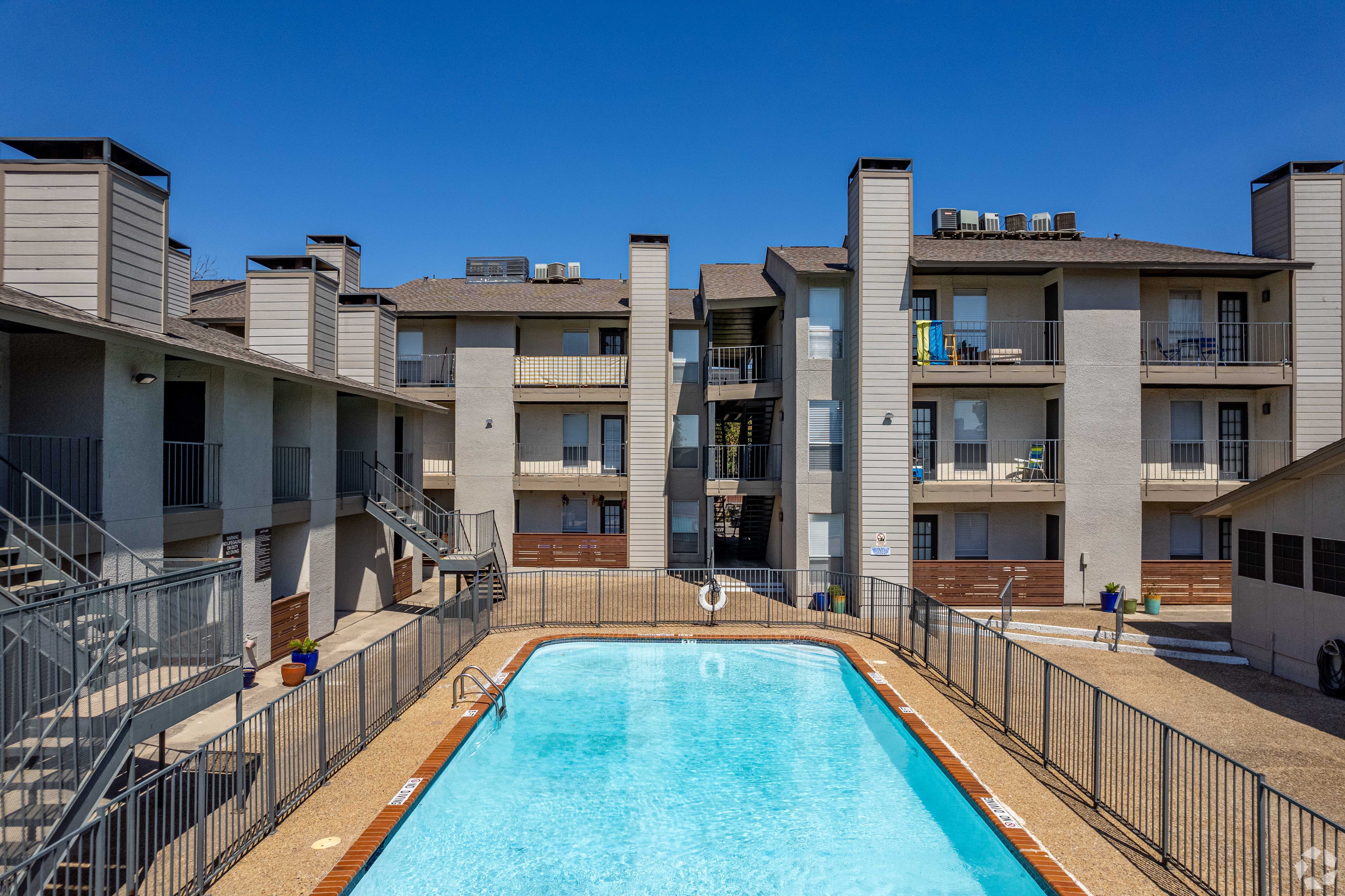 Garrett Gardens at 2015 N. Garrett Ave. is one of two properties purchased by Dallas-based Perry Guest Co. (Mike Healey/CoStar)