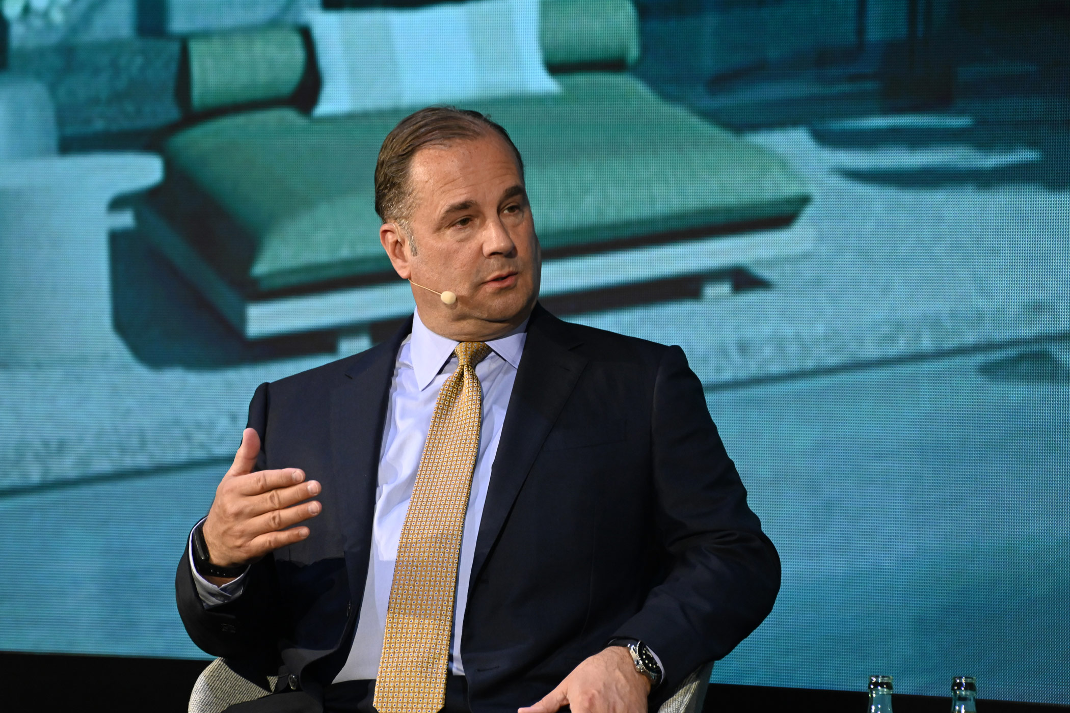 Marriott International President and CEO Tony Capuano speaks at the International Hospitality Investment Forum EMEA about the company's objective to keep travelers within Marriott's brand ecosystem. (Bryan Wroten)