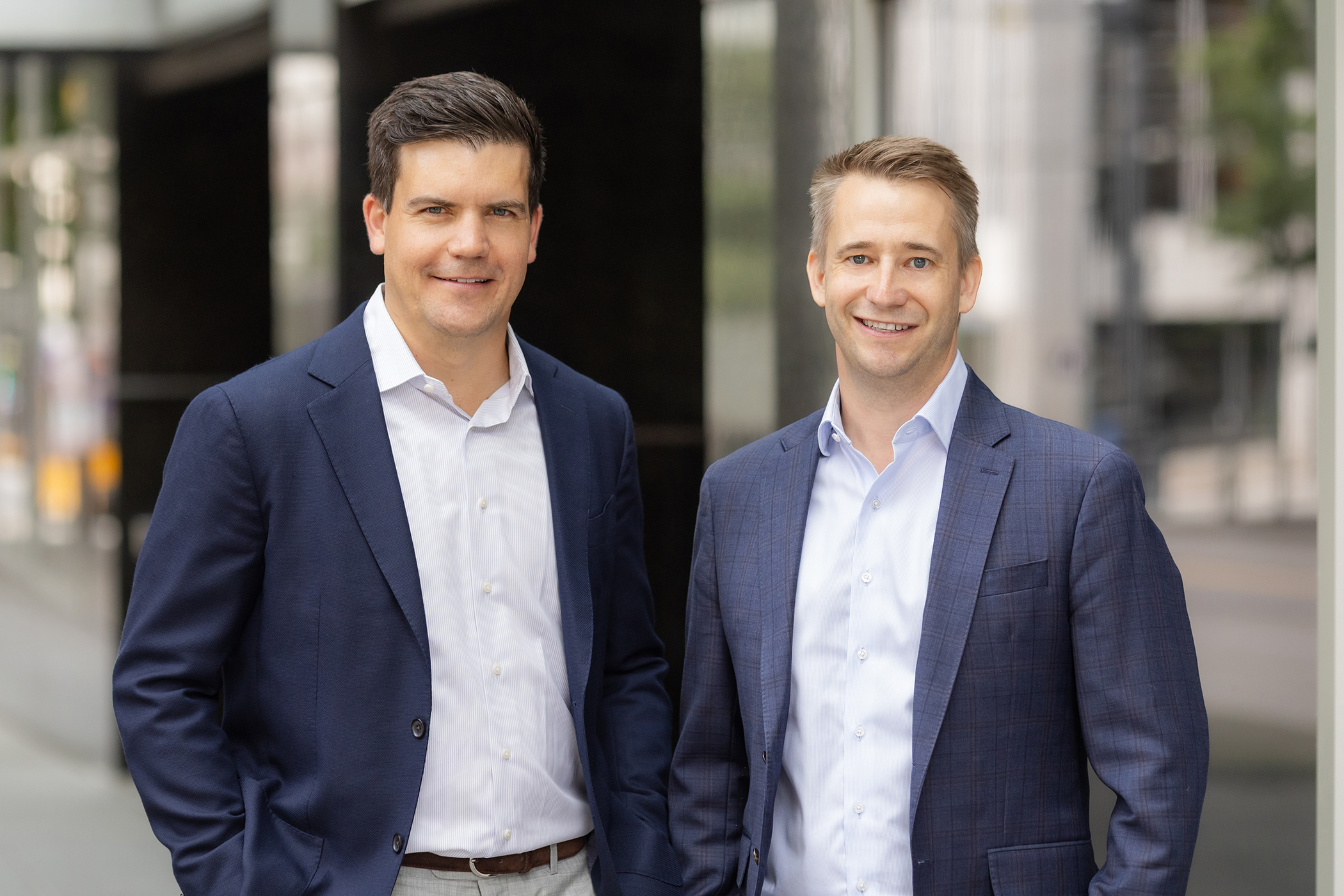 Paul Roeter, left, and Cooper Engst cofounded the firm that acquires or provides financing for hundreds of millions of dollars worth of multifamily properties in Greater Seattle. (Keelbase Capital)