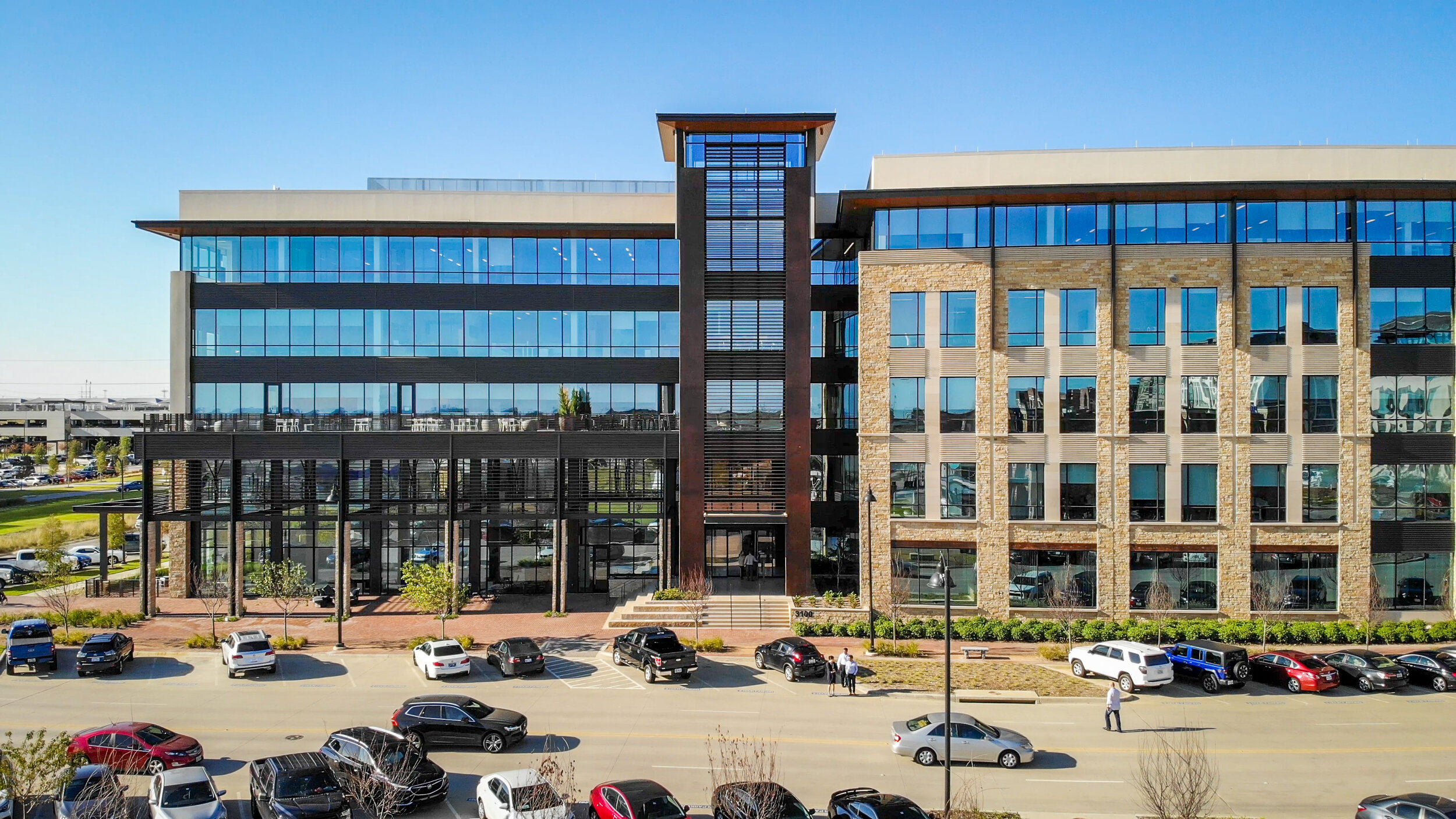 The five-story, 250,000-square-foot office building at 3100 Olympus Blvd. in Coppell has landed a new subtenant, brokers say. (Billingsley Co.)