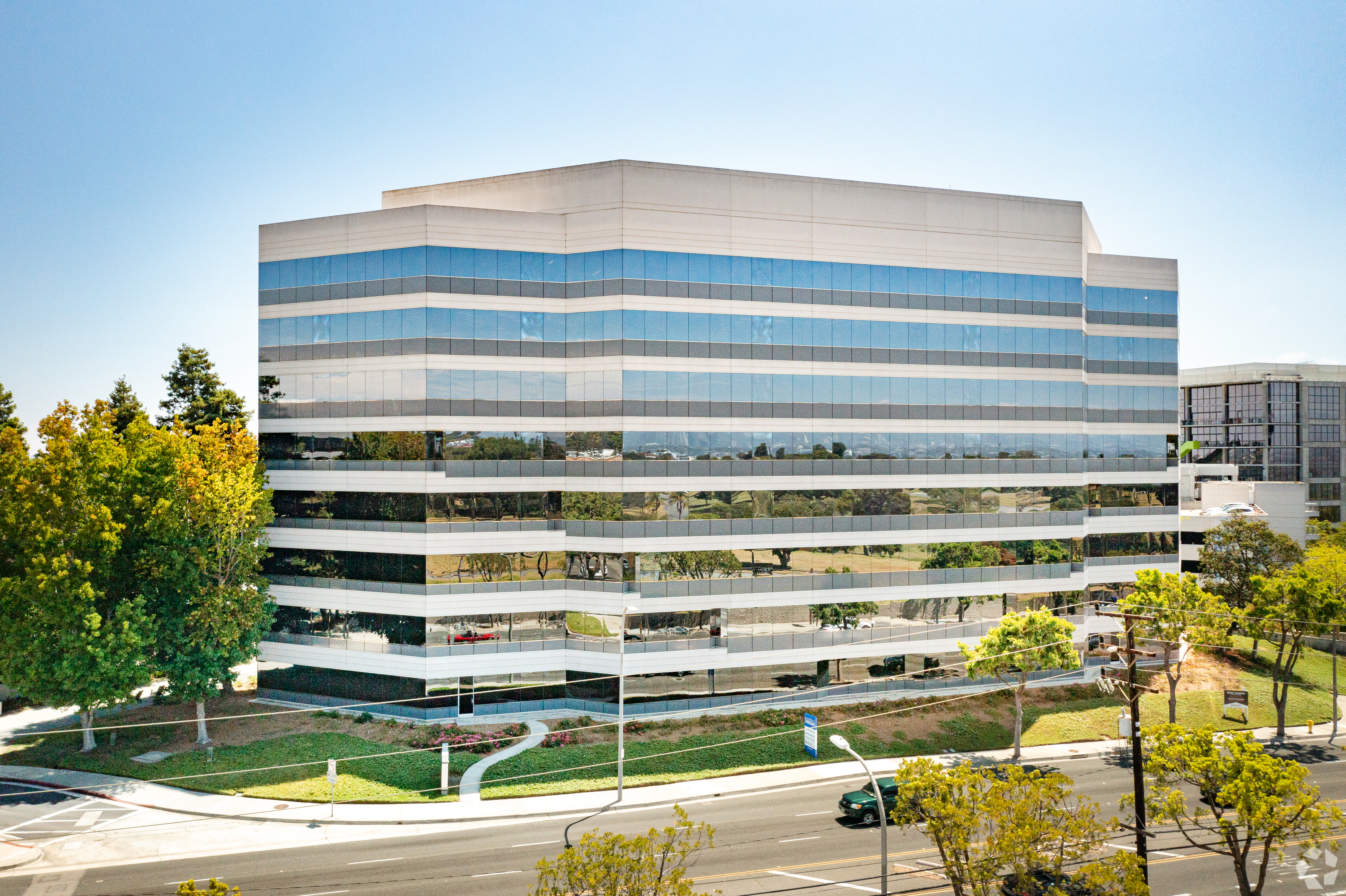 New York Life Investments sold 400 Corporate Pointe, above, and another building on an office campus in Culver City, California. (CoStar)