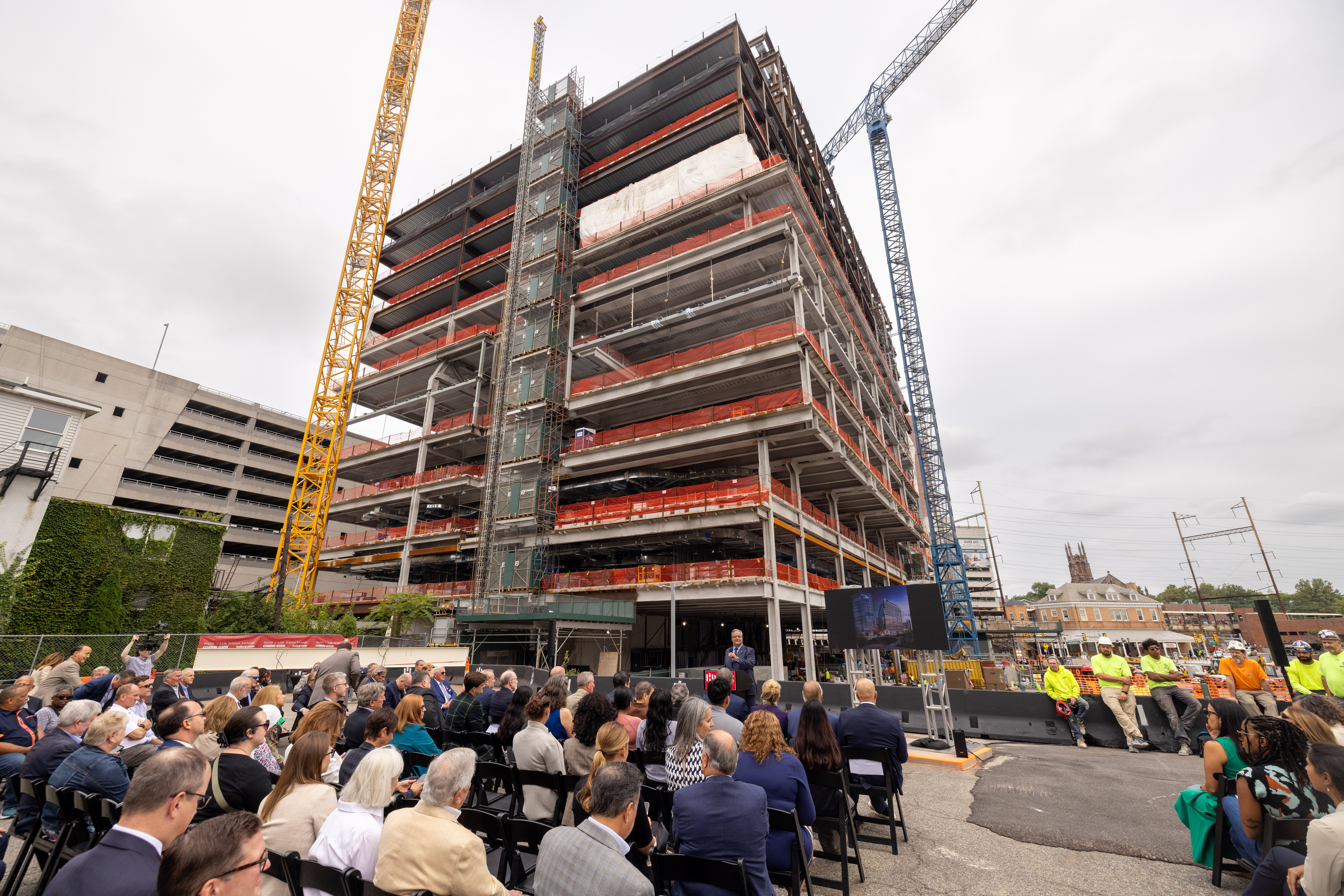 About 250 people attended the topping-off ceremony for H-1 at HELIX in New Brunswick, New Jersey, on Friday. (DEVCO)