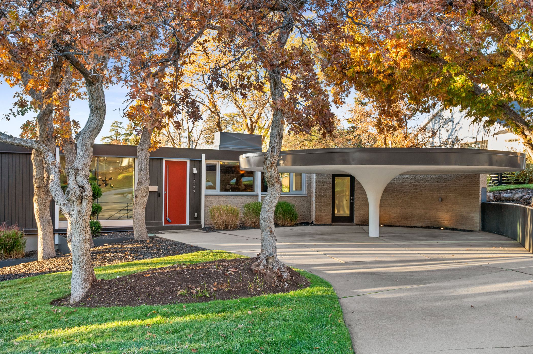 Mushroom carport caps off modernist Eduard Dreier-designed Salt Lake City home. Seller asks $2.25 million.