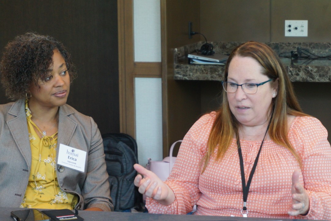 Crescent Hotels & Resorts' Erica Lipscomb (left) and Concord Hospitality Enterprises' Karen McWilliams speak during a roundtable at the 2022 Revenue Optimization Conference Americas. (Trevor Simpson)