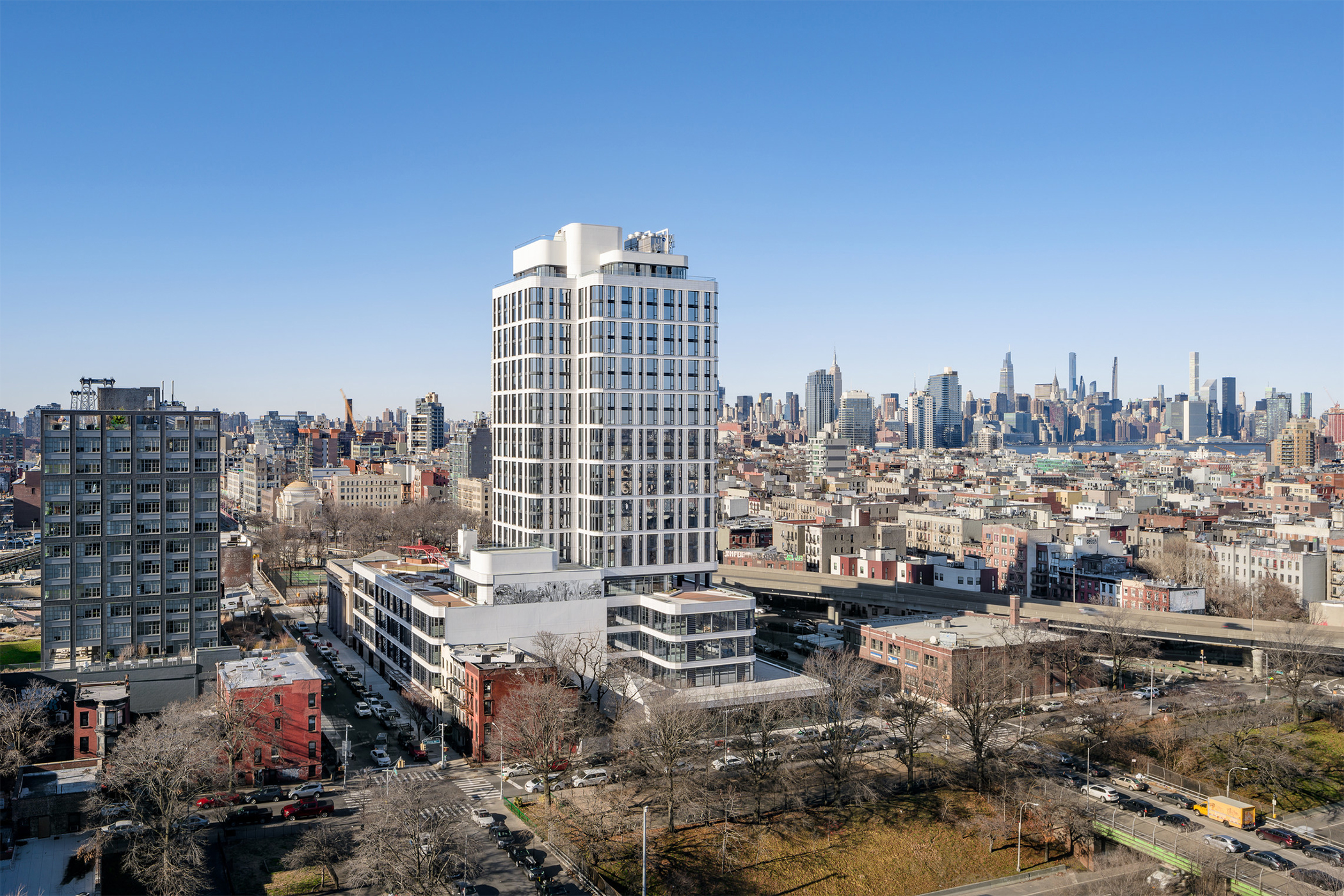 Investment firm Incoco Capital has led the $156.6 million purchase of the residential and parking components of the Dime mixed-use building in the Williamsburg neighborhood of Brooklyn. (Tavros Holdings) 
