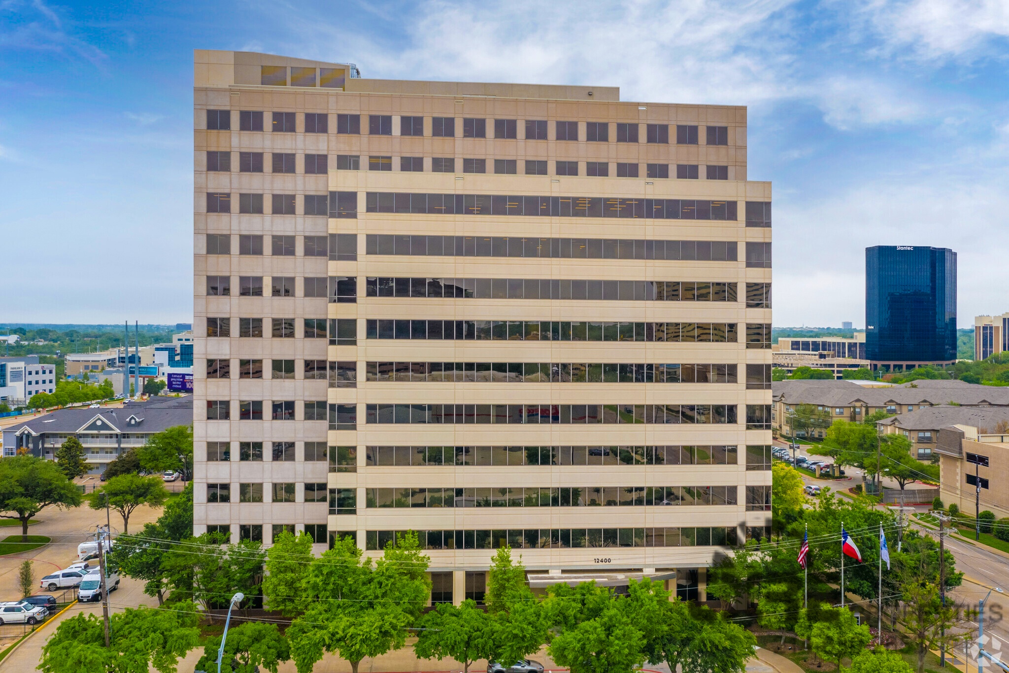 Churchill Tower, a 12-story office building seen here, could get some new tenants with the help of its new ownership group. (CoStar)