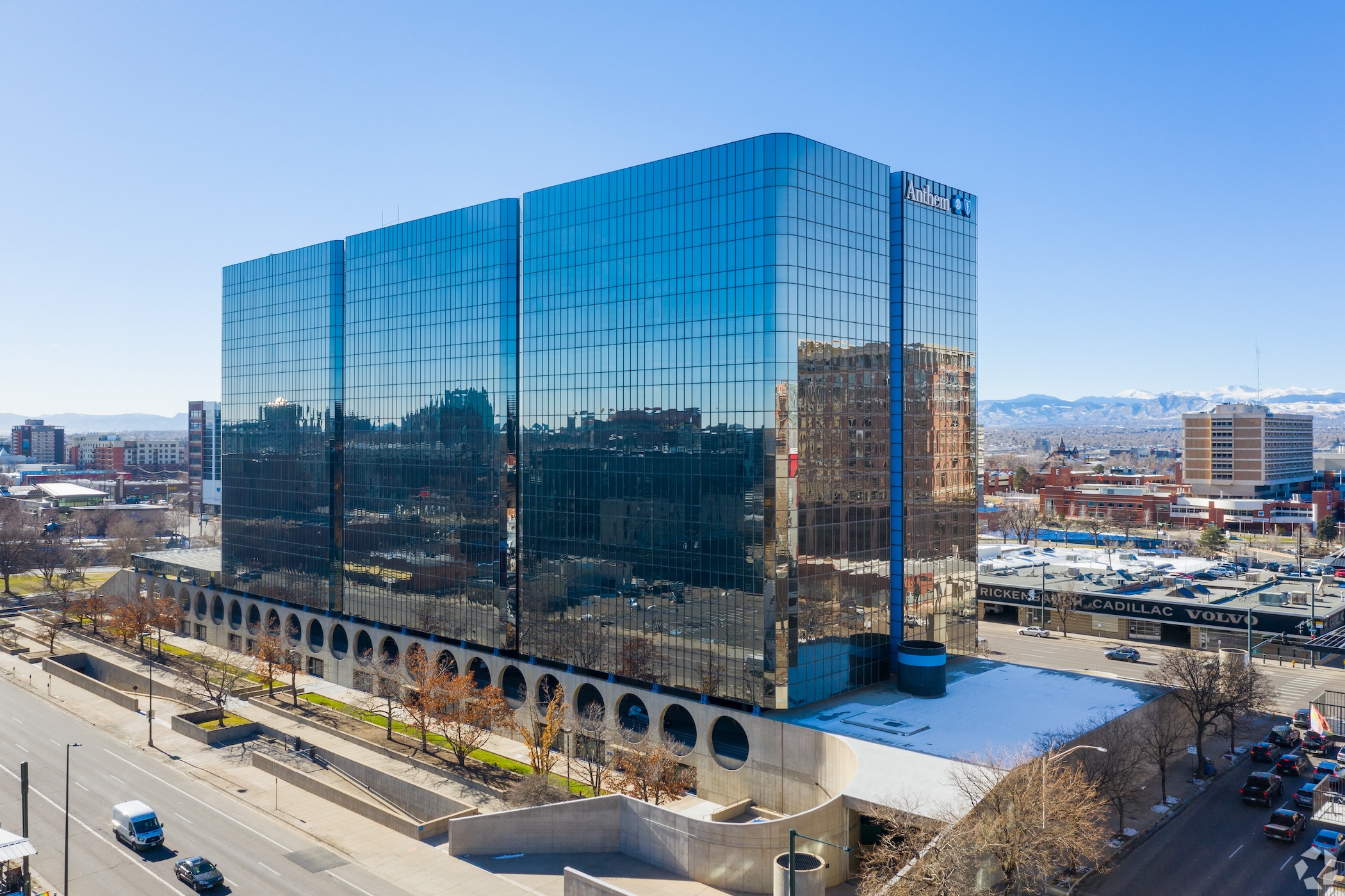 One of Denver's largest office tenants to slash downtown footprint ...