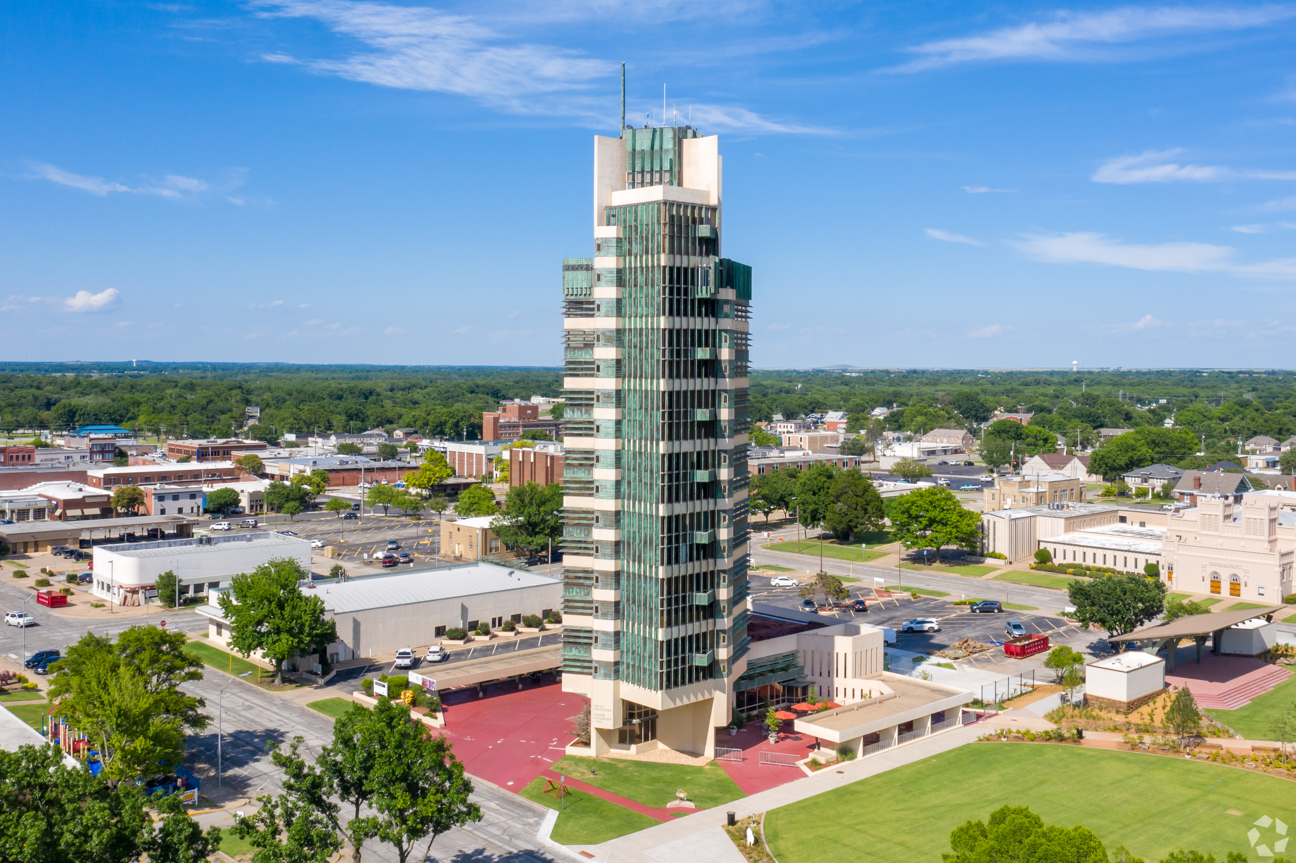Price Tower, a 19-story skyscraper designed by Frank Lloyd Wright, could be restored under new ownership. (CoStar)