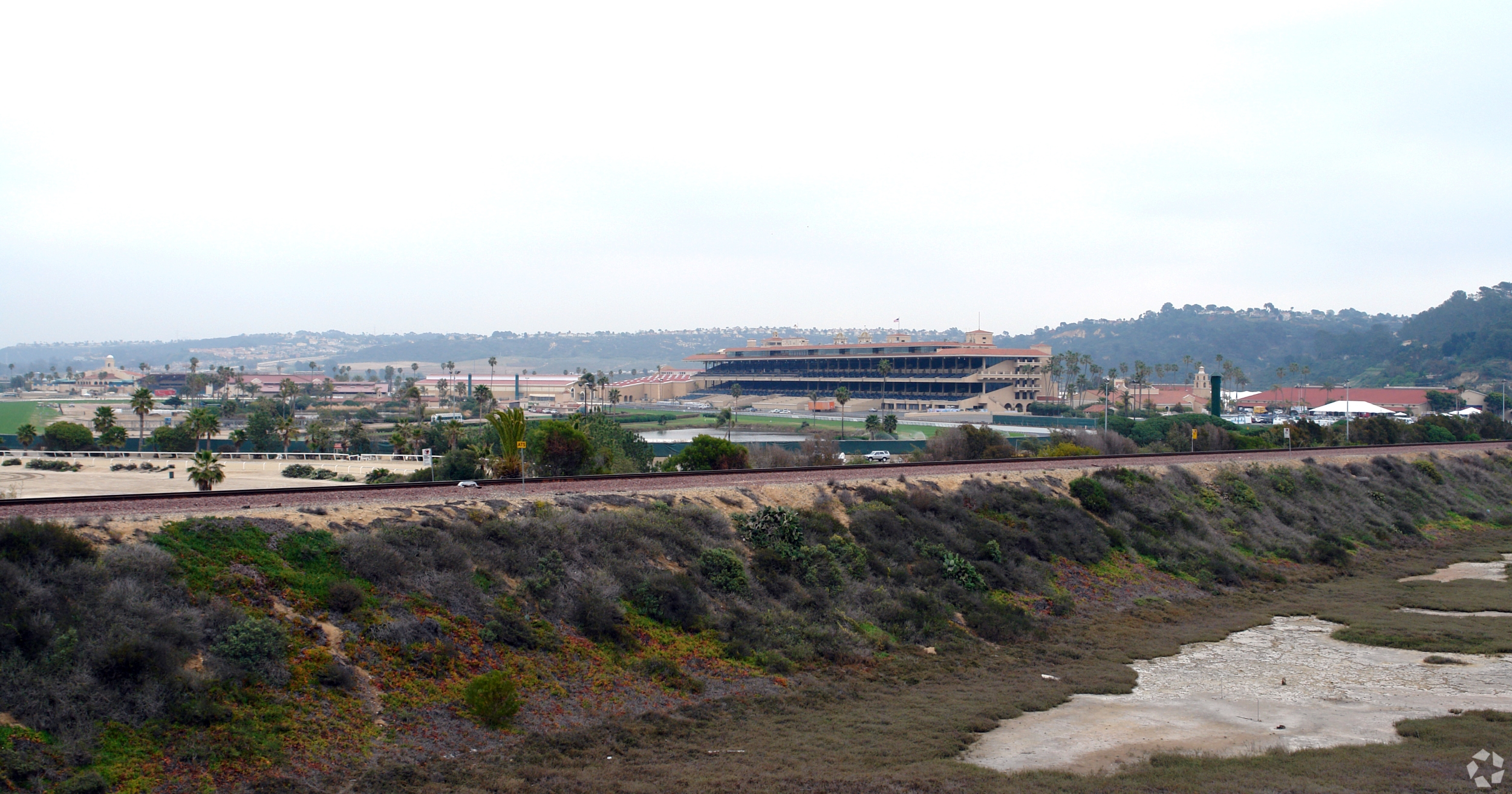 A California agency is looking to better monetize fairgrounds real estate surrounding the famed Del Mar Racetrack near San Diego. (CoStar)