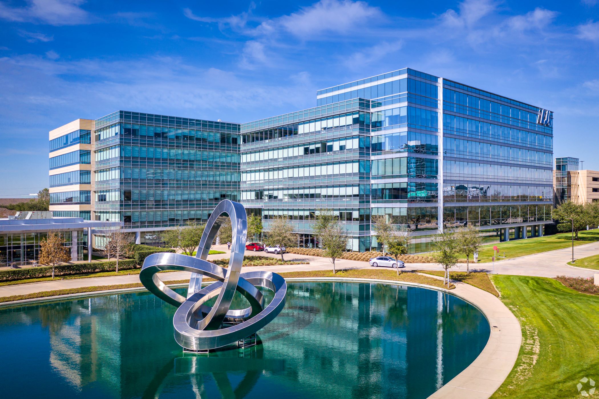 Vroom is winding down its e-commerce operations and laying off more than 500 people in the Houston area, including at its headquarters at 3600 W. Sam Houston Parkway S (pictured) in the Westchase District. (CoStar)