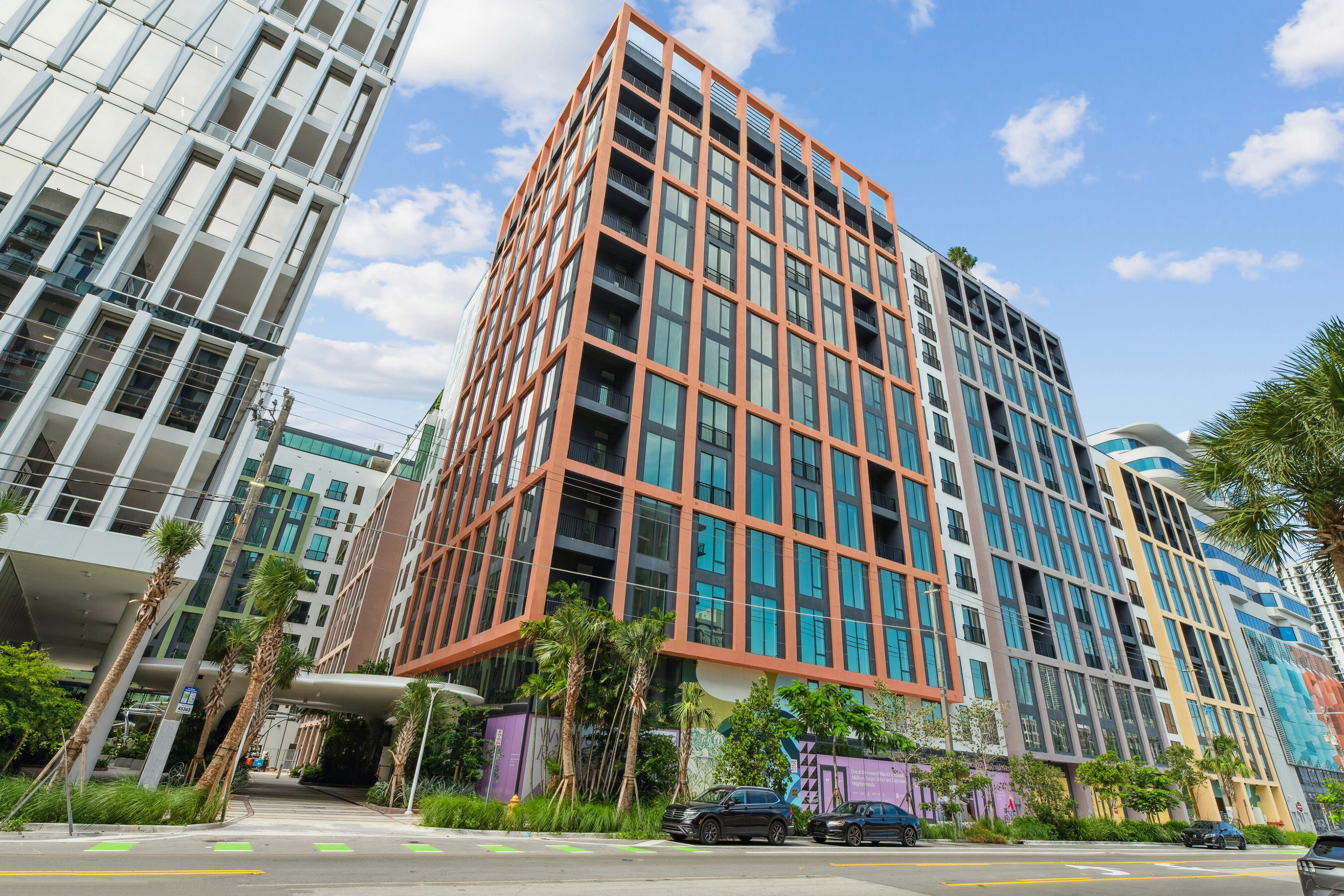 Residents are expected to begin moving into Wynwood Plaza, a 1 million-square-foot mixed-use development in Miami's arts district, featuring a restaurant, offices and a pedestrian plaza at the center of the property. (L&L Holding Co., Oak Row Equities)