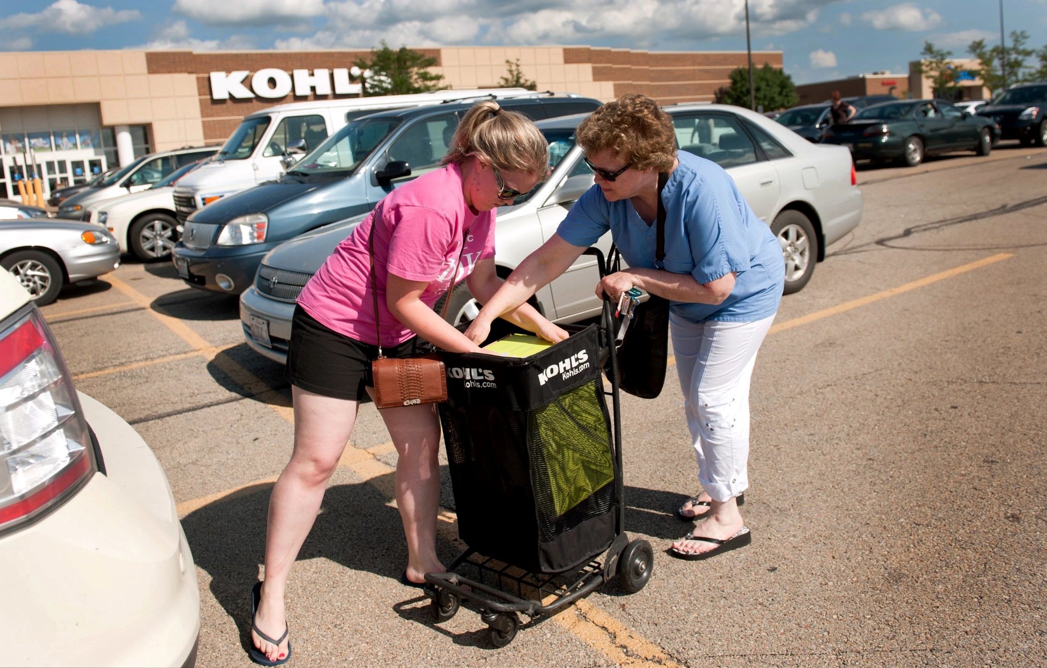 Consumer spending helped boost gross domestic product by a better-than-expected 2.6% in the third quarter, the Commerce Department reported. (Getty Images)