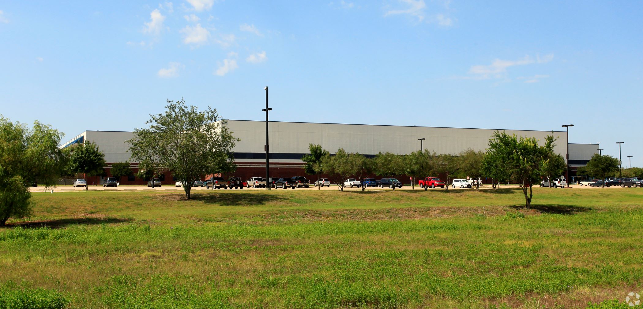 Ryder System Inc. announced plans to lay off 801 employees at Applied Materials' facility at 9700 U.S. Highway 290 (pictured) in Austin, Texas. (CoStar)