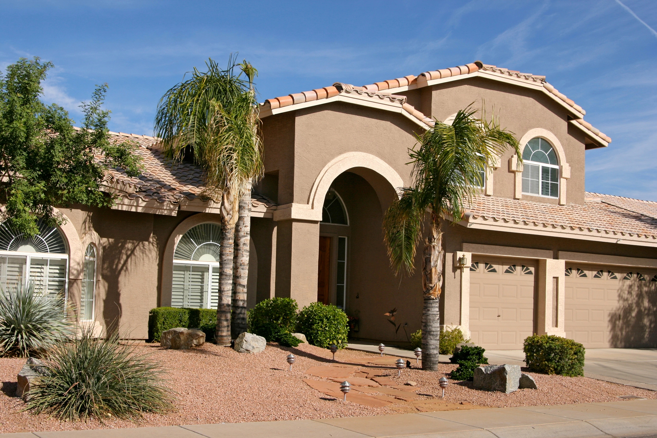 Sales of existing single-family homes increased slightly from the prior month in May but were down from a year earlier. (Getty Images) 