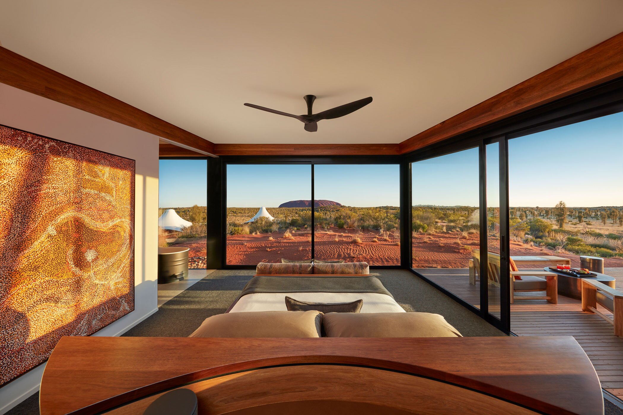 Baillie Lodges’ portfolio of hotels in remote destinations includes Longitude 131°, which has a view of Ayres Rock, an ancient sandstone formation better known as Uluru in central Australia. (Baillie Lodges)