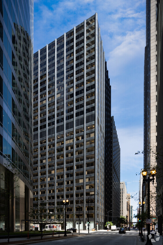 Menashe Properties paid $45 million for the 29-story office tower at 230 W. Monroe St. in Chicago's Loop business district. (Robert Gigliotti/CoStar)