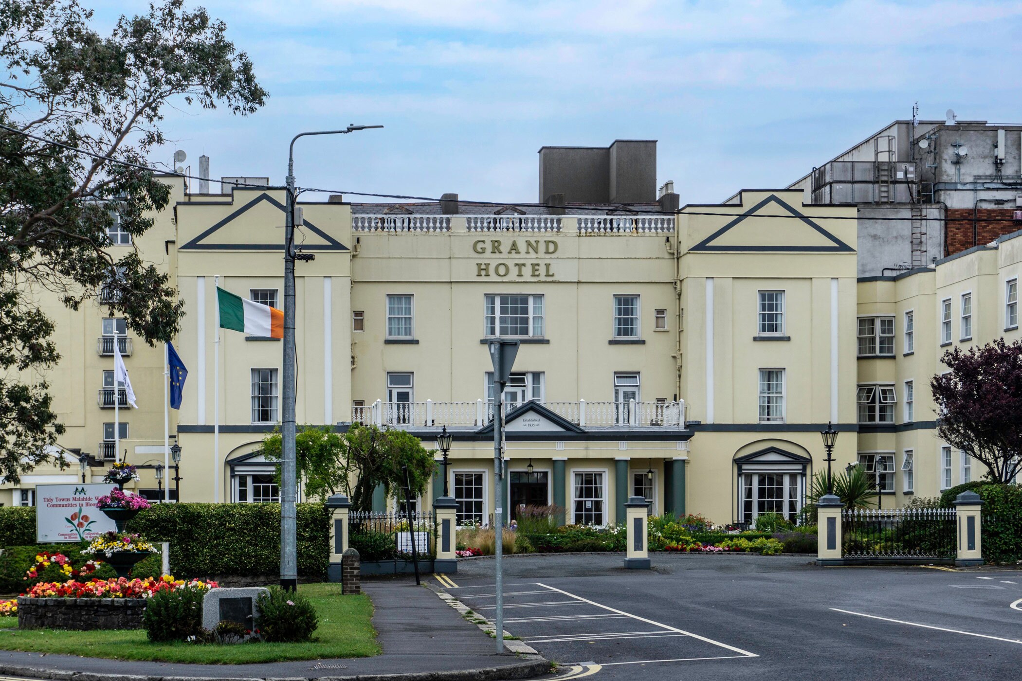 The Grand Hotel Malahide in coastal Ireland is expected to be the seventh property owned by FBD Hotels & Resorts, as the region posts increased hospitality investment sales. (Adobe Stock)