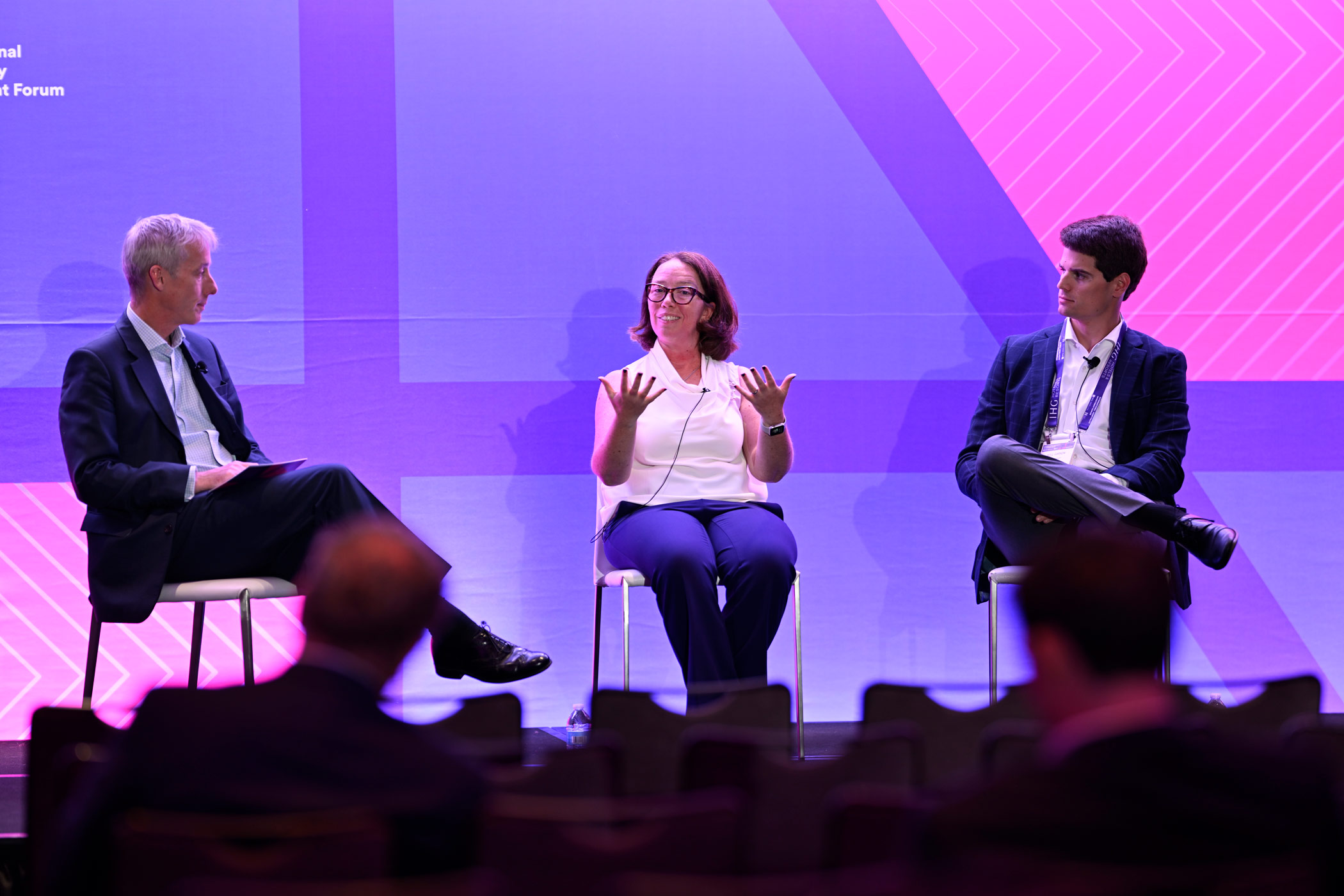 Richard Williamson, chief operating officer of Considerate Group, left, led the conversation on climate resiliency in hospitality with Breana Wheeler, director of operations for the U.S. at BREEAM, and Will Garson, vice president at MCR. (Matt Rickman, Questex)