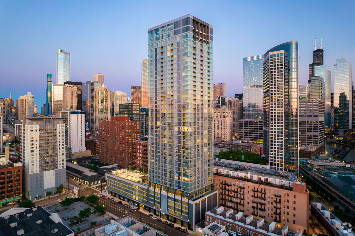 Onni Group is set to refinance eight apartment projects, including the 369 Grand tower in Chicago's River North. (Gian Lorenzo Ferretti/CoStar)