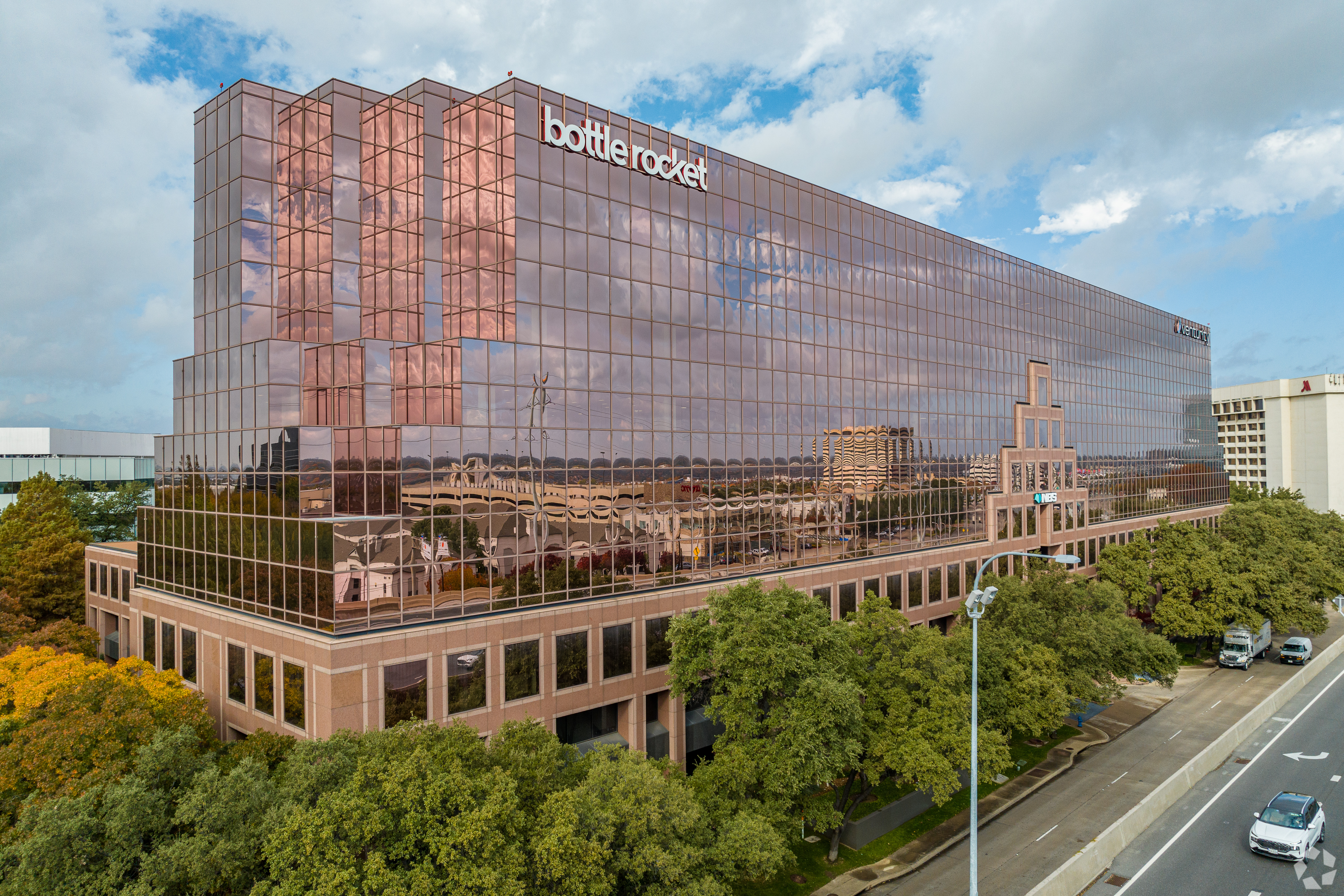 A longtime tenant at the Aberdeen, a nine-story, 314,289-square-foot office building along the Dallas North Tollway, has downsized its office space. (Mike Healey/CoStar)