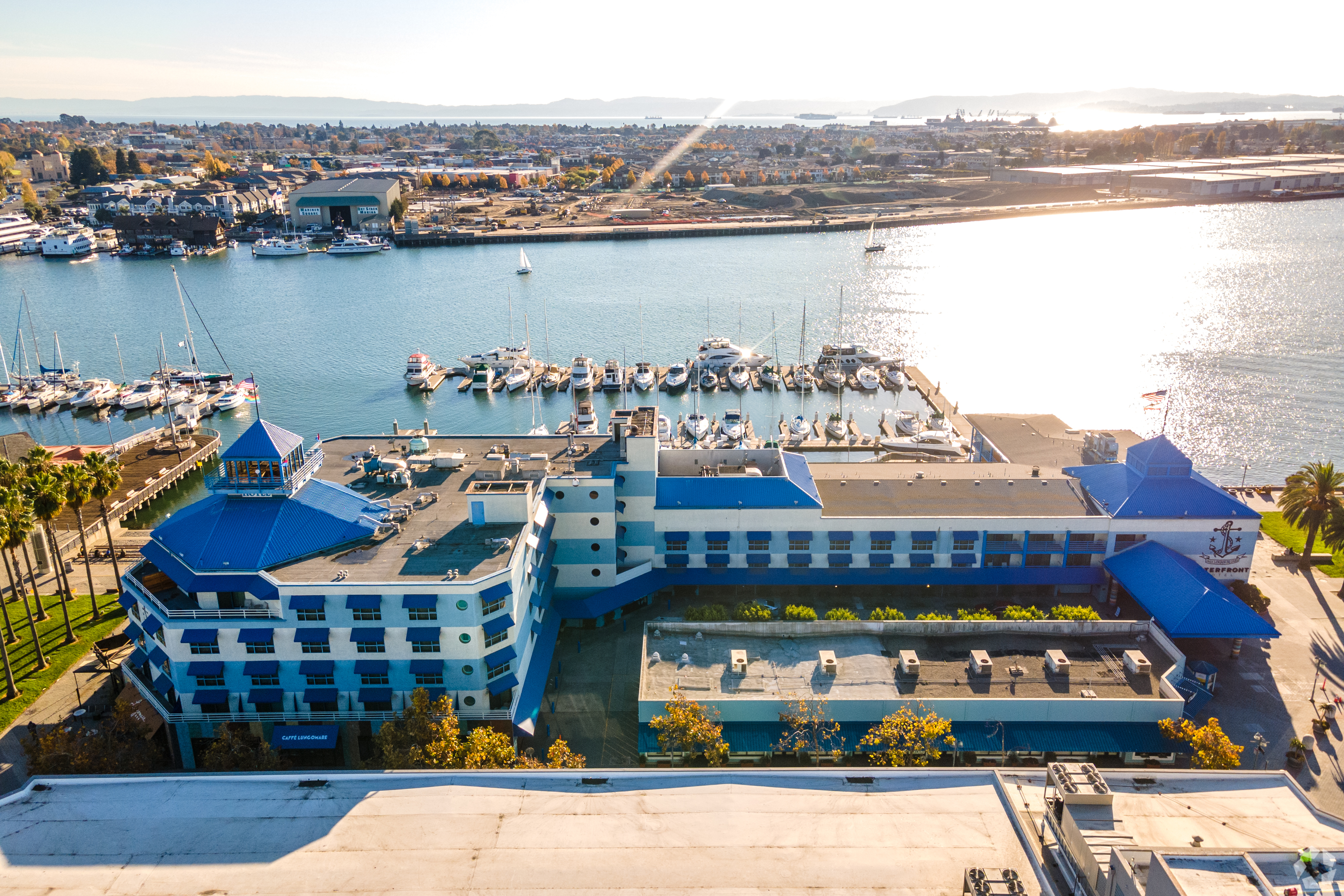 With its blue-and-white nautical theme, the 145-room hotel had been a fixture for decades in the heart of Oakland’s Jack London Square. (CoStar)