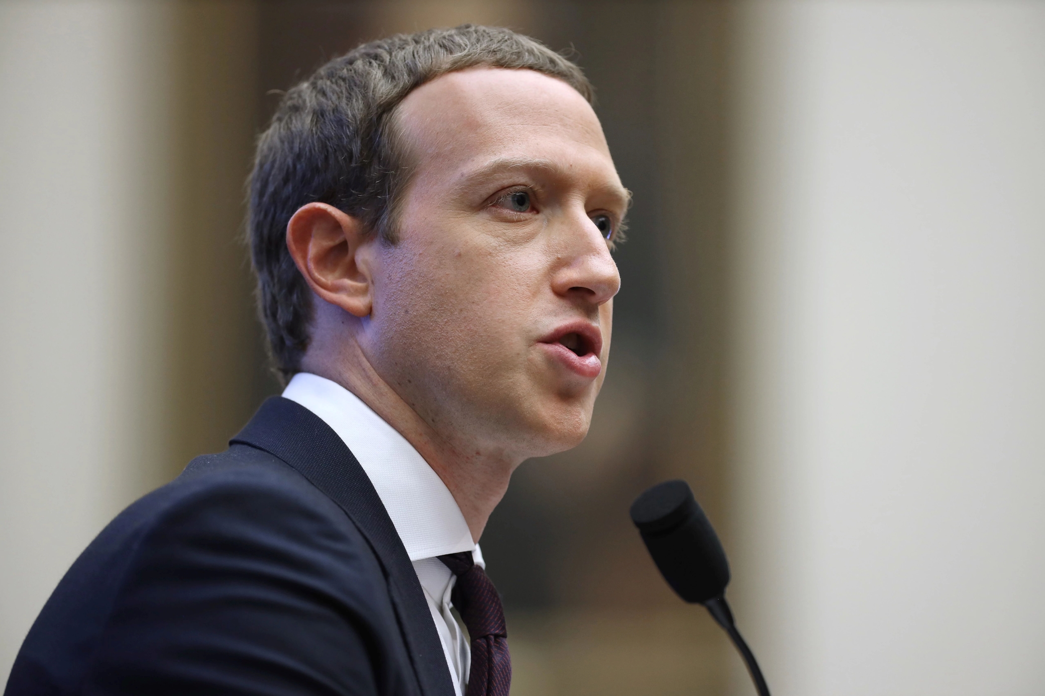CEO Mark Zuckerberg said Facebook parent Meta plans further restructuring as it evaluates hybrid work arrangements. (Getty Images)