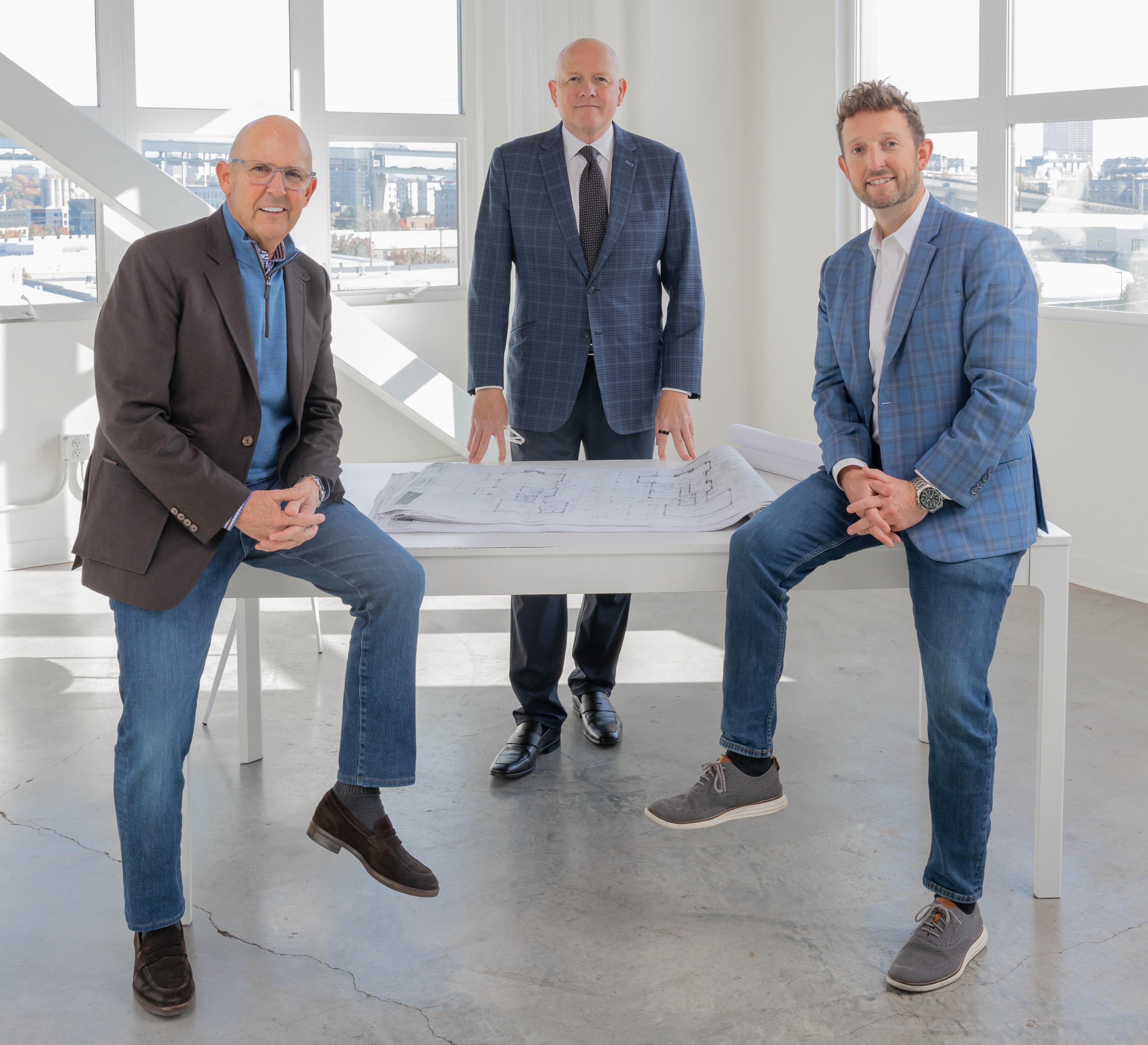 Father and son team up with friend to bring Christie's International brand to Portland, Oregon