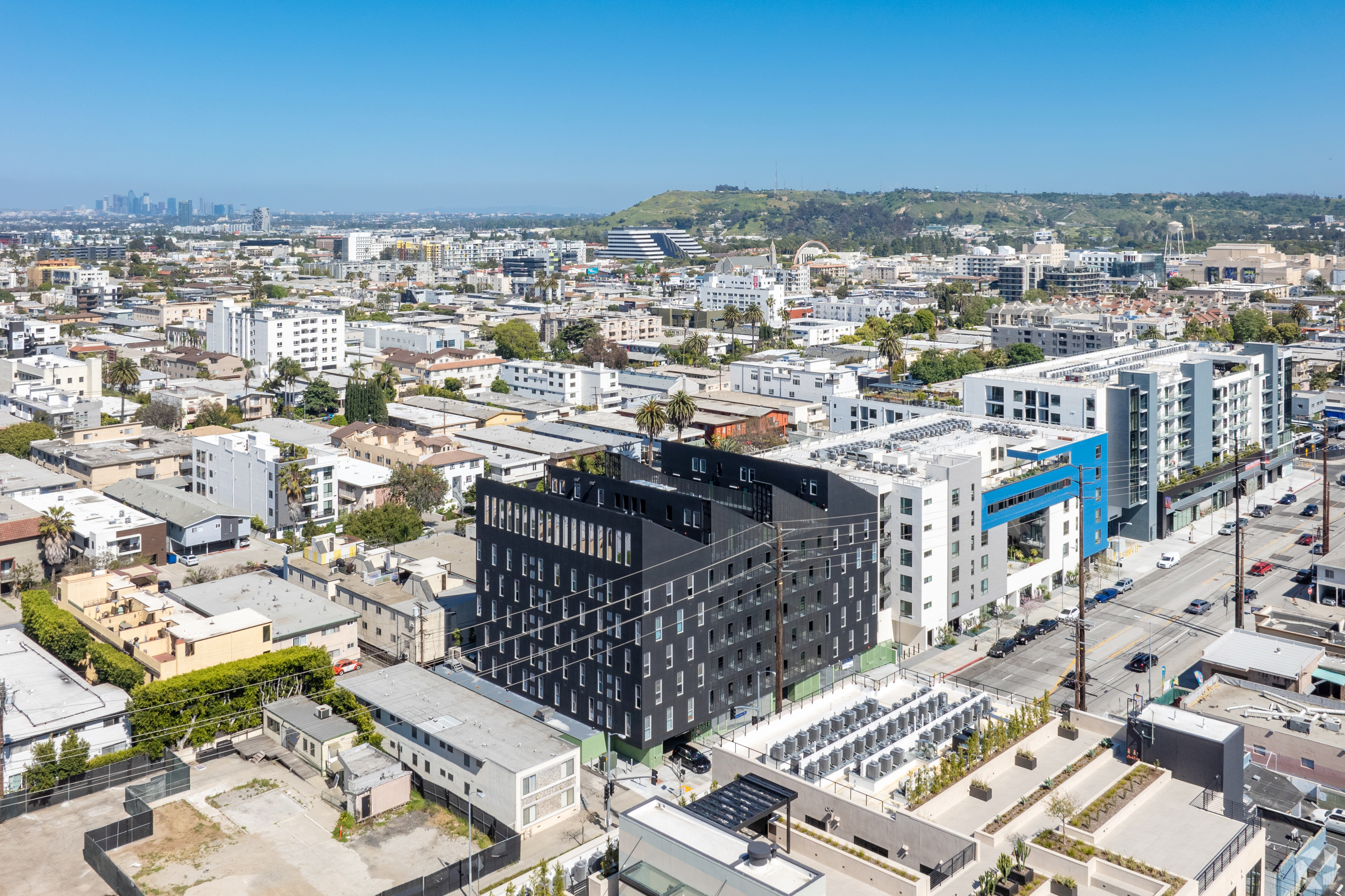 Los Angeles hopes to encourage developers to build more multifamily projects along commercial corridors like The Jagger in the Palms neighborhood. (CoStar)