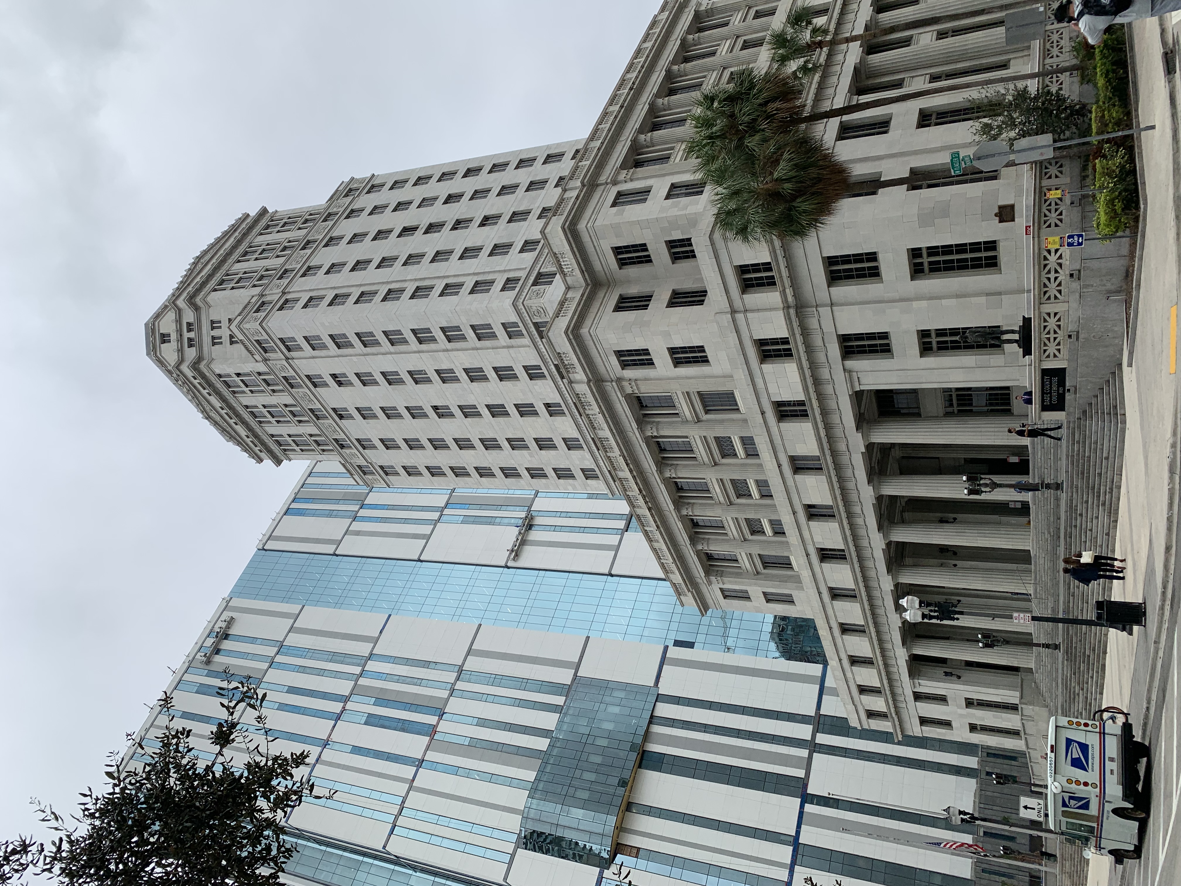 The historic Dade County Courthouse in downtown Miami, right, is next to the new Miami-Dade Courthouse, left. (Joshua S. Andino/CoStar News)