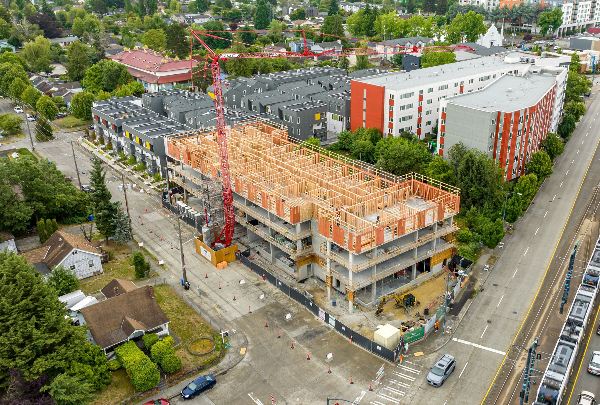Construction crews have started framing the eight-story Trace 4001 multifamily development in south Seattle. (Nitze-Stagen)