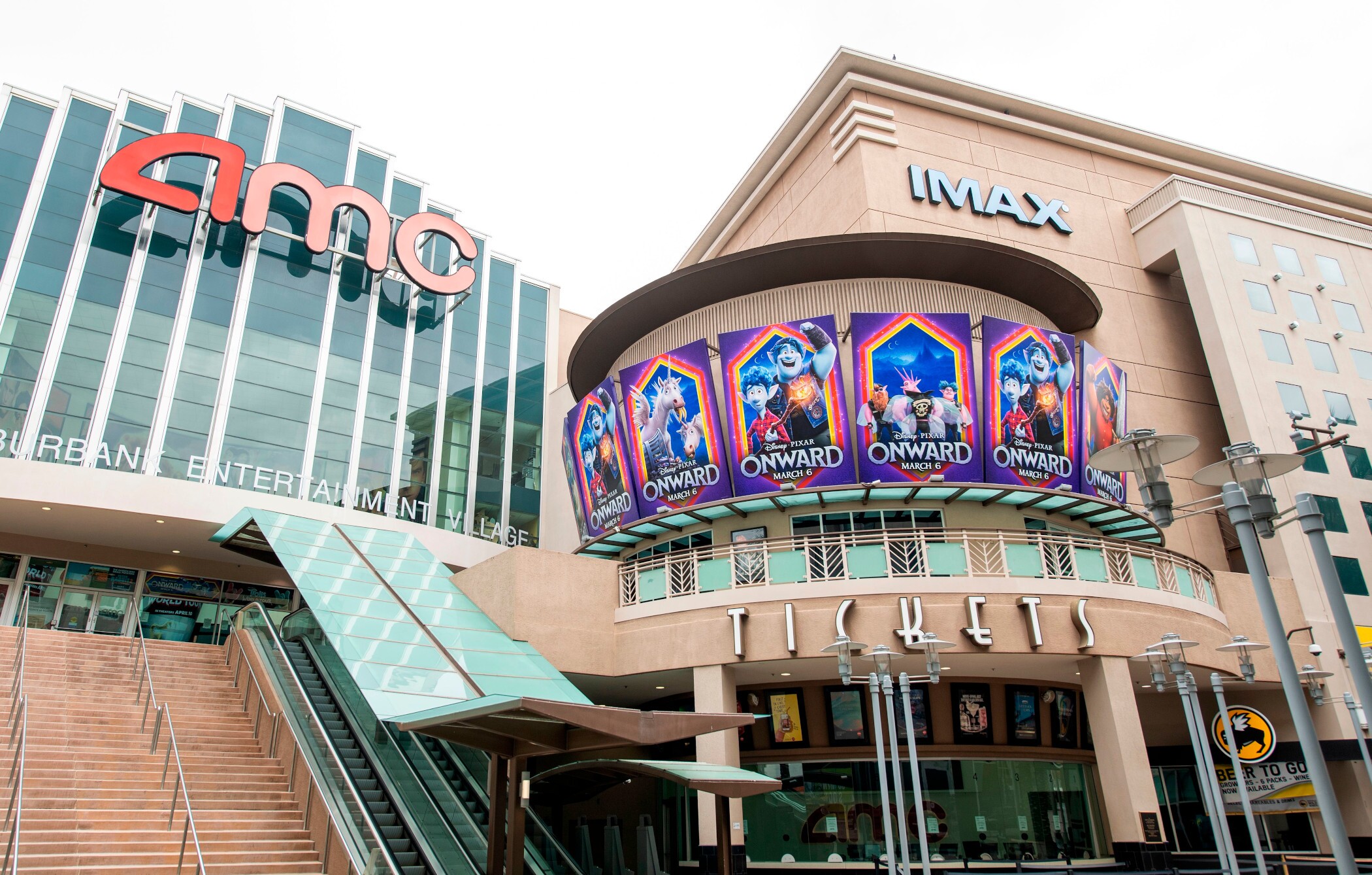 amc-theaters-boosts-revenue-looks-to-pay-debt-faster-as-moviegoers-return