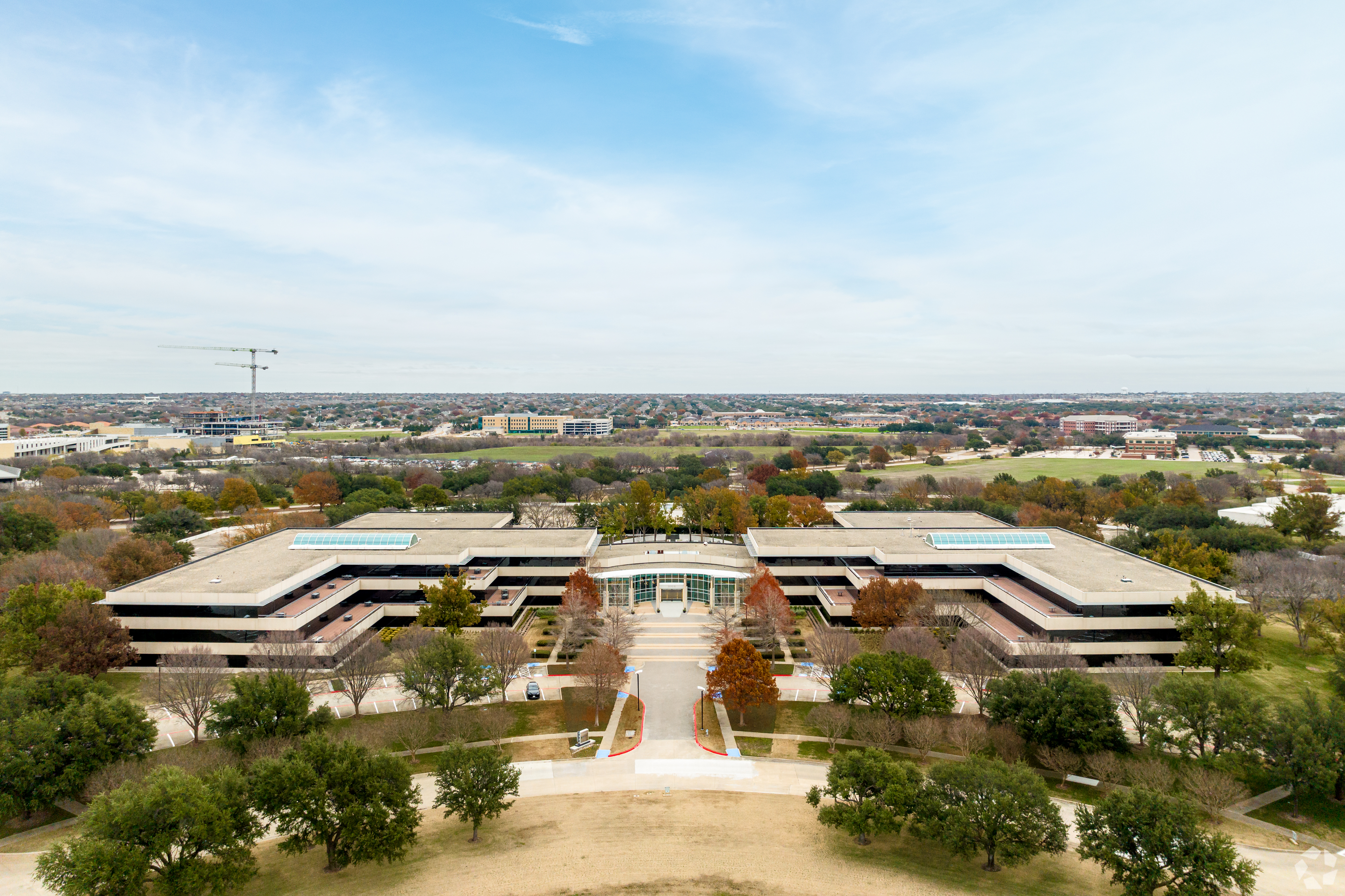 An aerial photo shows the office campus at 5320 Legacy Drive in Plano, Texas. Raising Cane's is buying this property for its new operations center as part of an economic incentive agreement with the city. (Adnan Jebbeh/CoStar)