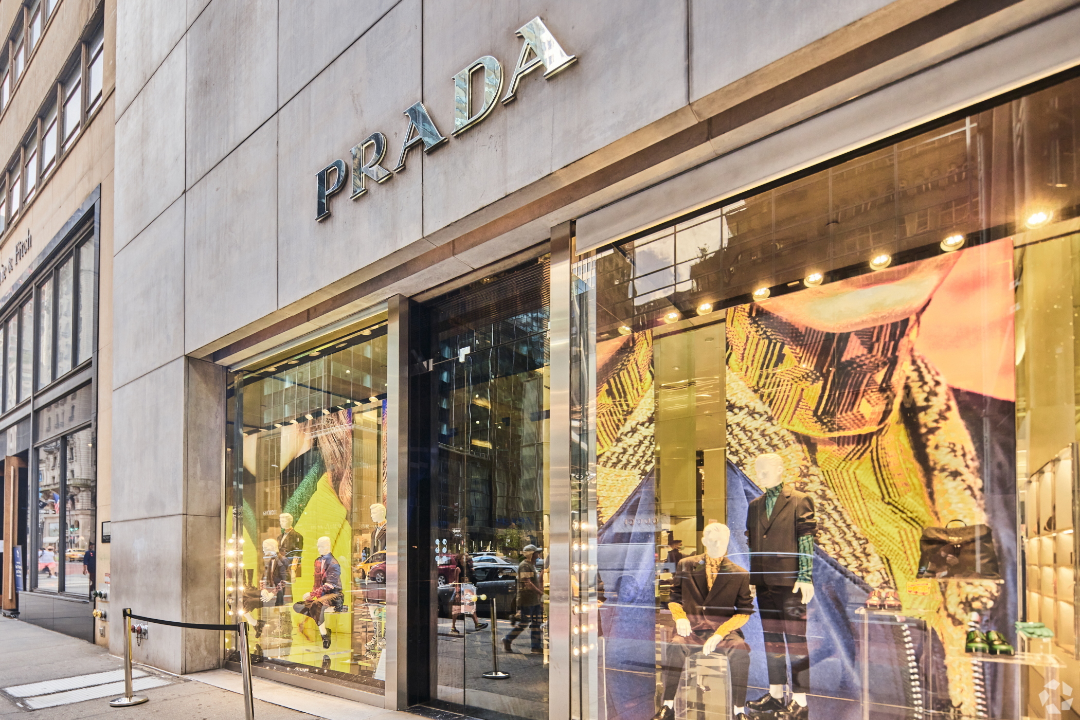 Prada Group acquired a pair of adjacent office buildings, with one housing its Fifth Avenue flagship, for $835 million. (CoStar)