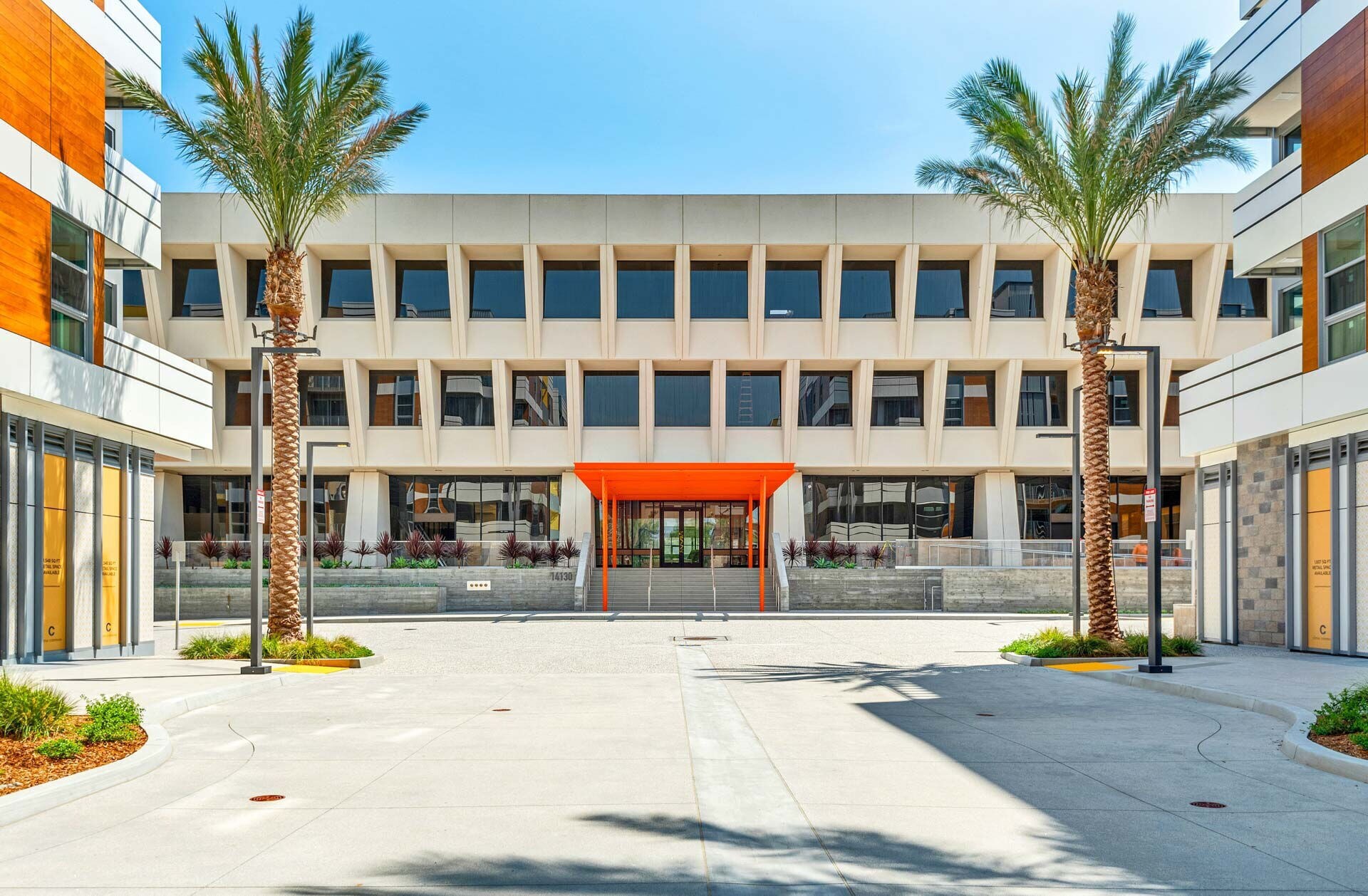 Developers have converted the former Sunkist headquarters in Sherman Oaks into a mixed-use complex with retail and luxury apartments. (CoStar)
